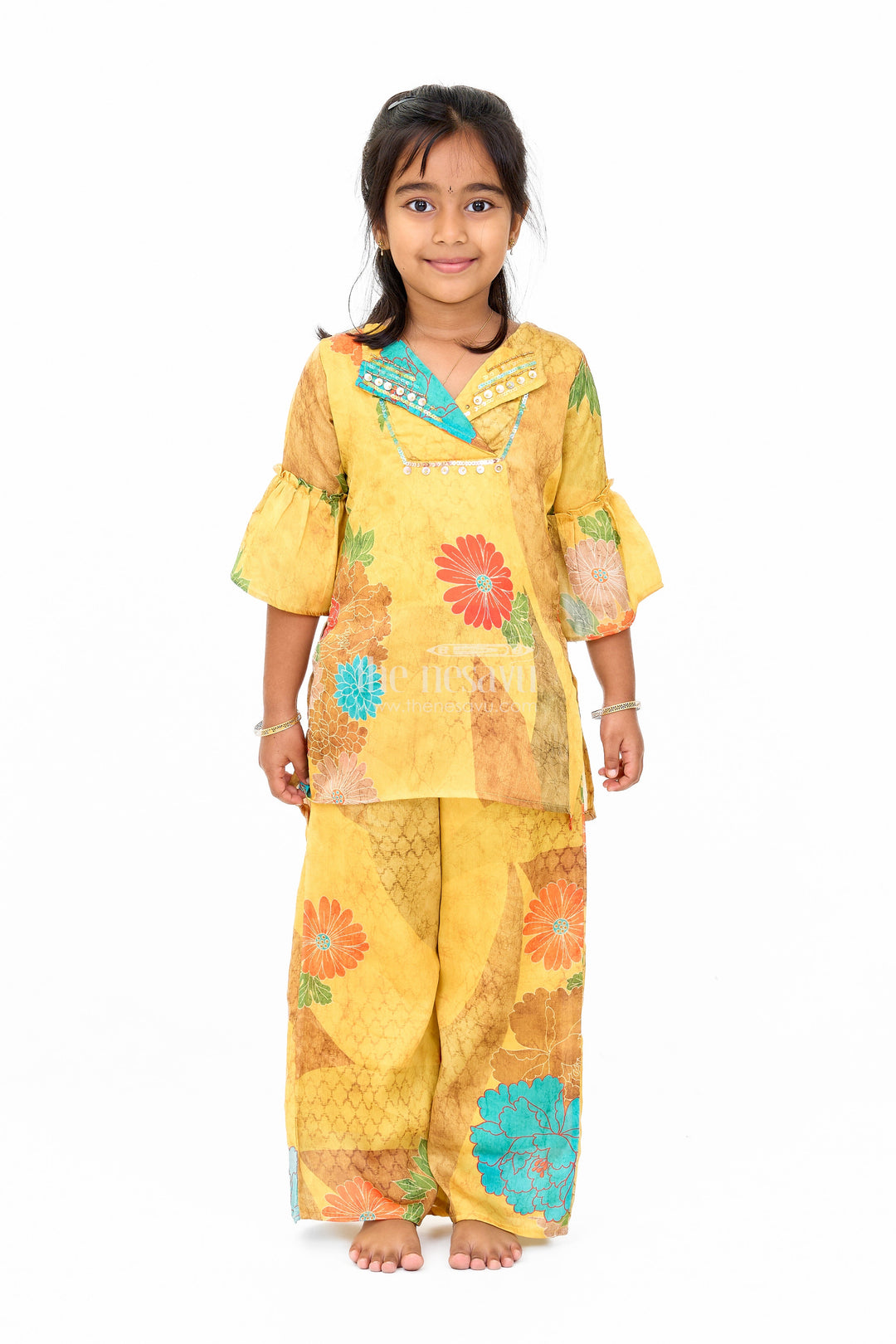 The Nesavu Girls Sharara / Plazo Set Mustard Mercerised Silk Cotton Girls Sharara Set with Bold Floral Print and Embellished Neckline Nesavu 24 (5Y) / Yellow GPS438A-24 Nesavu Mustard Mercerised Silk Cotton Sharara Set Girls Floral Print Sequined Top