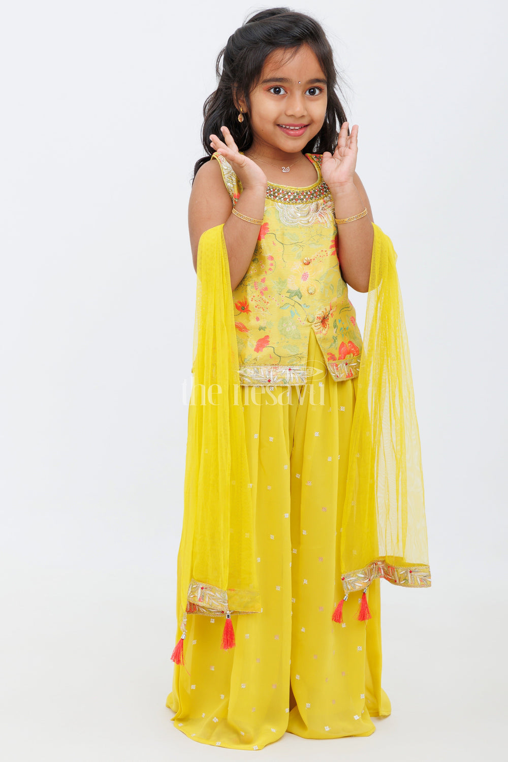 The Nesavu Girls Sharara / Plazo Set Mustard Plazo Set with Kurthi for Girls Featuring Floral Appliqu and Mirror Work Nesavu Mustard Plazo Set with Kurthi for Girls Featuring Floral Appliqué and Mirror Work Nesavu