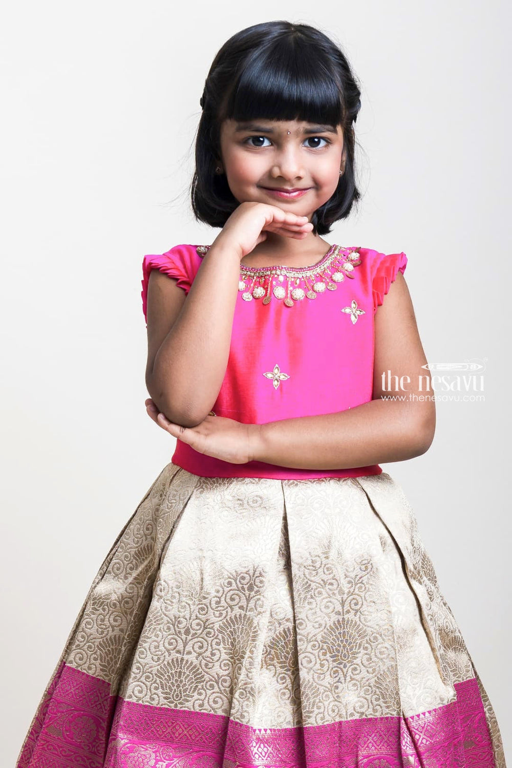 The Nesavu Silk Party Frock Neck Embroidery Pink Yoke And Sandal Semi-Silk Frocks With Long Zari Border Nesavu Pink And Sandal Semi-Silk Frocks For Girls| Pongal Special Collection| The Nesavu
