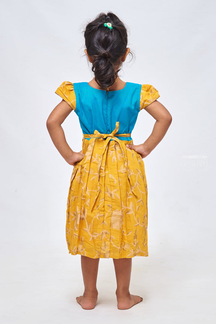 The Nesavu Girls Cotton Frock New Designs of Frocks - Yellow Floral Beauty Cotton Frock with Blue Yoke for Girls Nesavu Knee-length Cotton Frock | Baby Frock Cotton | The Nesavu