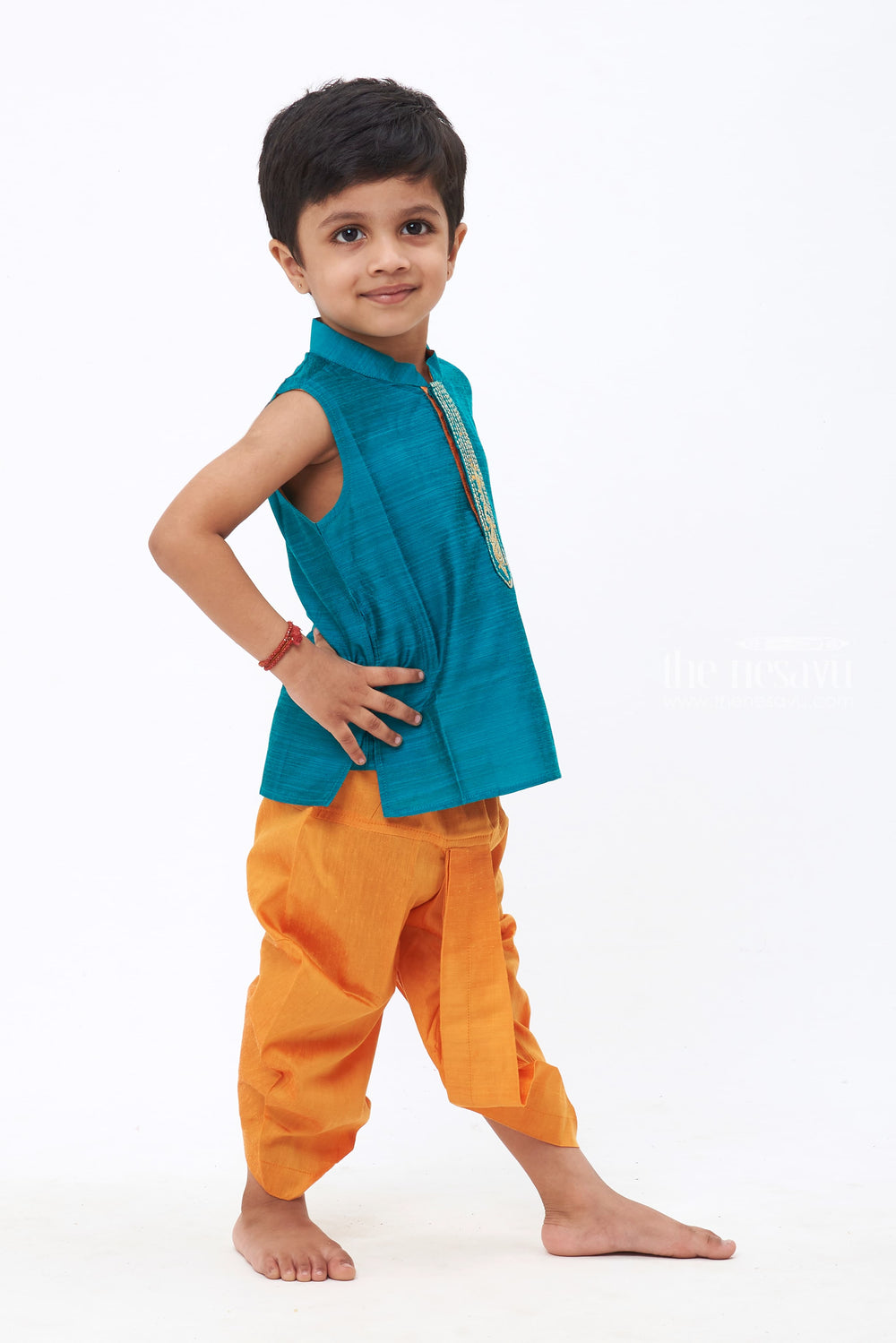 The Nesavu Boys Dothi Set Ocean Harmony: Boys' Teal Blue Kurta with Orange Dhoti Set & Embellished Detailing Nesavu Tradition Meets Trend | New Festive Collections of Boys Kurta Panchagajam Set | The Nesavu