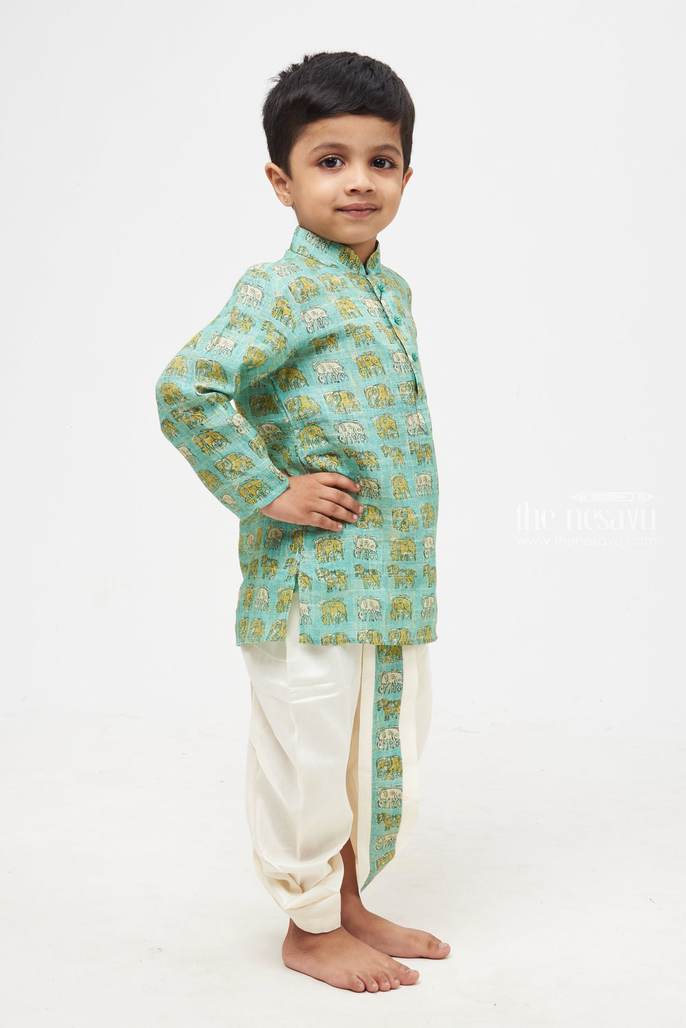 The Nesavu Boys Dothi Set Oceanic Allure: Blue Animal-Print Kurta & Pristine White Panchagajam Set for Boys Nesavu Boys Ethnic Set Online | Latest Ethnic Wear Kurta Panchagajam Set | The Nesavu