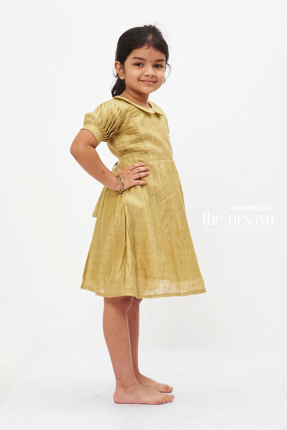 The Nesavu Girls Cotton Frock Olive Gold Charm Frock: Classic Puff Sleeve Dress with Golden Detailing for Girls Nesavu Traditional Olive Green Puff Sleeve Dress for Girls | Elegant Gold Trimmed Frock | The Nesavu