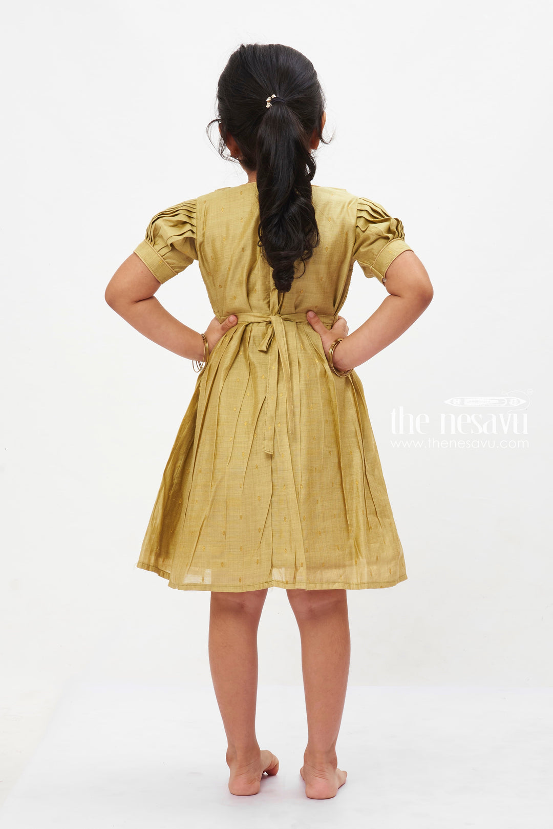 The Nesavu Girls Cotton Frock Olive Gold Charm Frock: Classic Puff Sleeve Dress with Golden Detailing for Girls Nesavu Traditional Olive Green Puff Sleeve Dress for Girls | Elegant Gold Trimmed Frock | The Nesavu