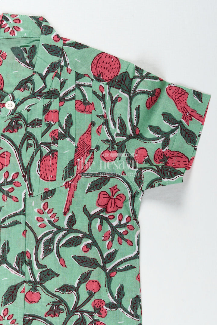 The Nesavu Boys Cotton Shirt Parrot and Botanical Print Boys Cotton Shirt Natureinspired Green Casual Wear Nesavu Nesavu Nature Inspired Green Cotton Shirt Boys Parrot Leaf Print Design Summer Days