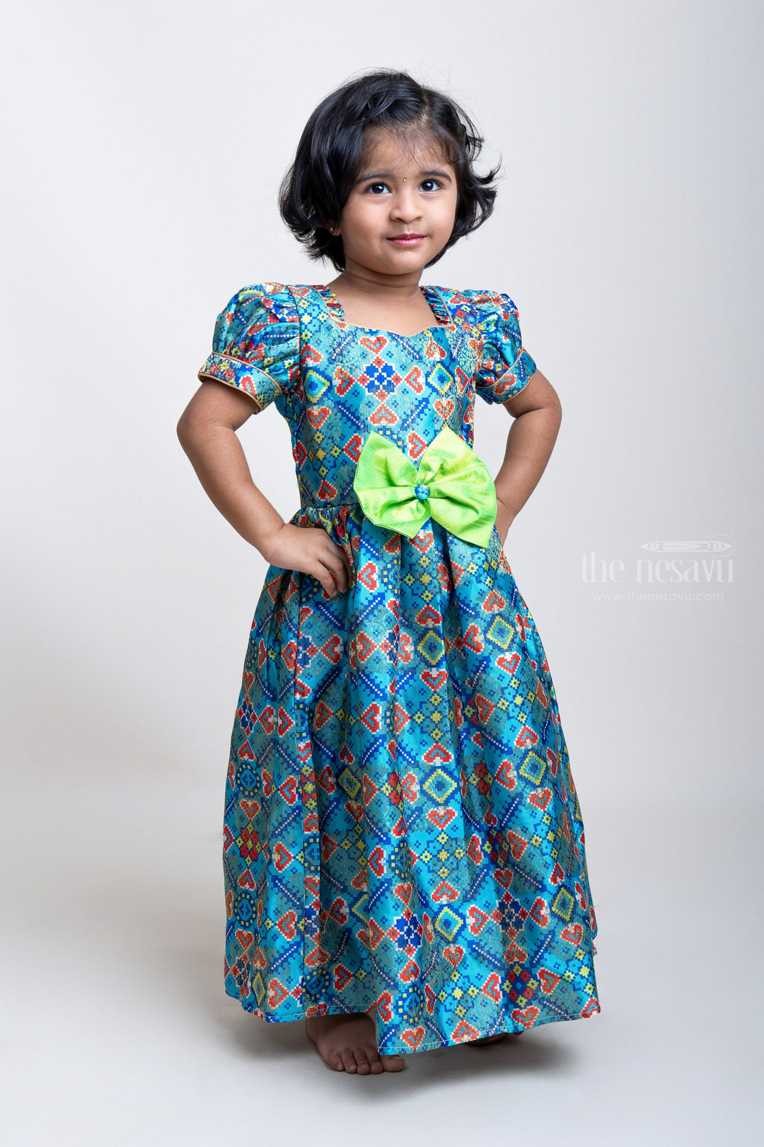 The Nesavu Silk Gown Patola Printed Blue Anarkali With Bow Embellishment For Girls Nesavu Silk Cotton Anarkali For Baby Girls | Ethnic Wear Dresses | The Nesavu