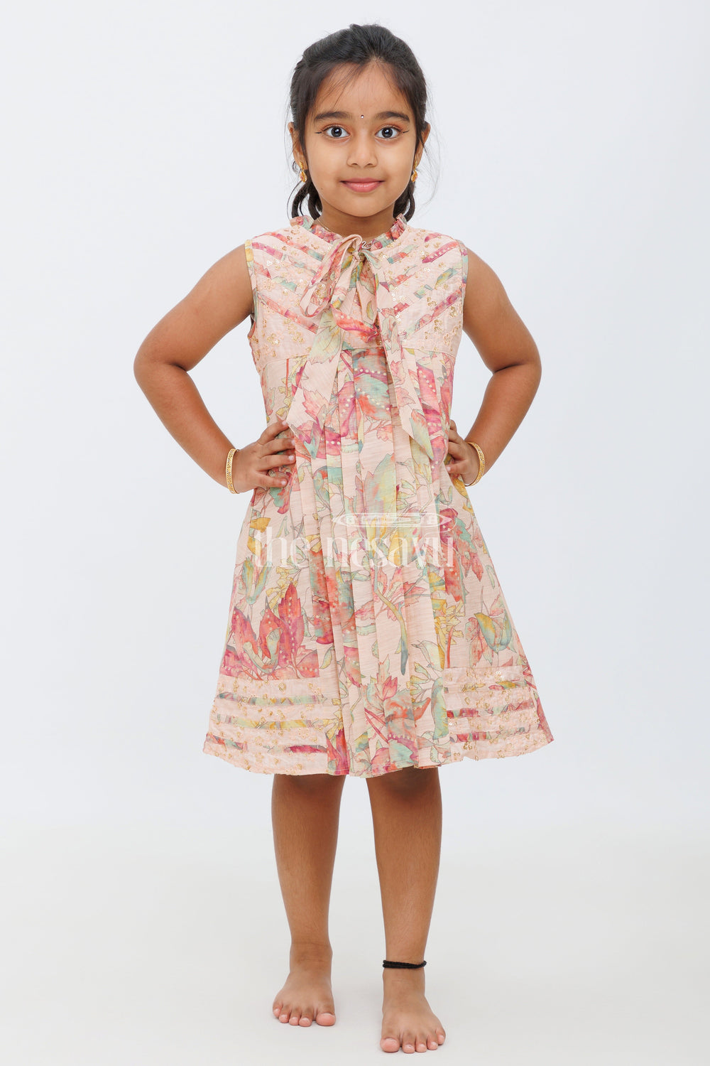 The Nesavu Girls Cotton Frock Peach Chanderi Frock with Watercolor Floral Print and Pleated Design for Girls Nesavu Peach Chanderi Frock with Floral Print and Pleats for Girls Nesavu