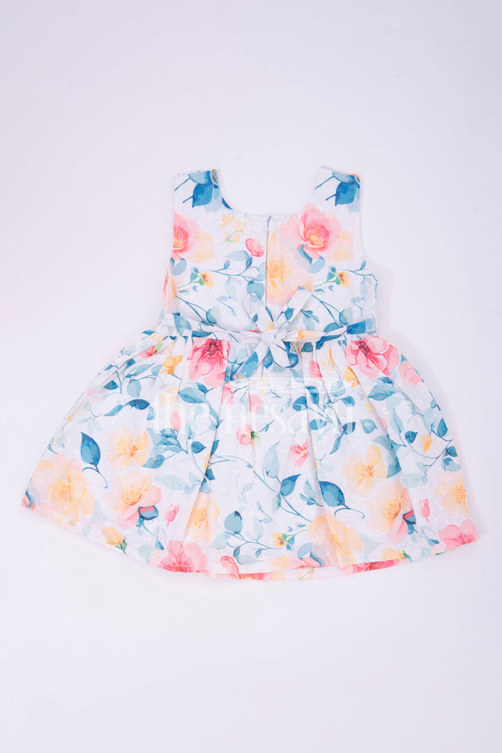 The Nesavu Girls Cotton Frock Peach Floral Sleeveless Baby Frock Nesavu 14 (6M) / multicolor BFJ582D-14 Peach Floral Sleeveless Baby Frock with Bow Detail