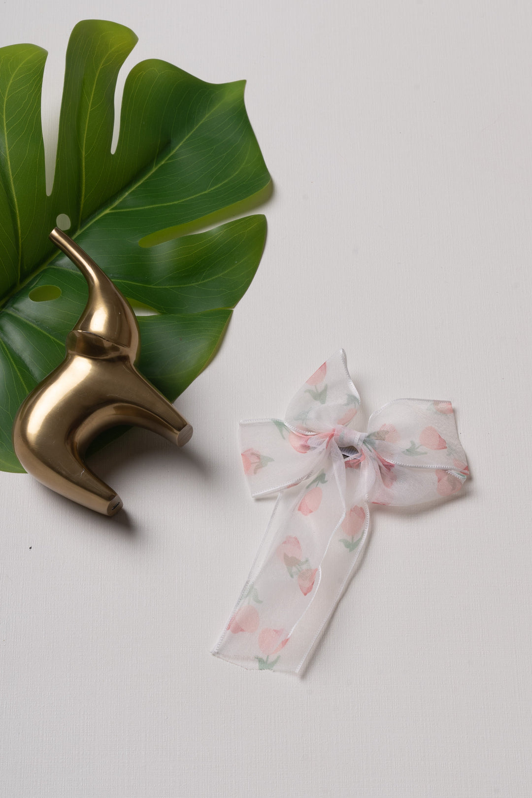 The Nesavu Hair Clip Petite Garden Bow Clip - The Perfect Finishing Touch for Her Tresses Nesavu White JHCL71C Adorable White Bow Hair Clip with Pink Floral Design for Stylish Girls | The Nesavu