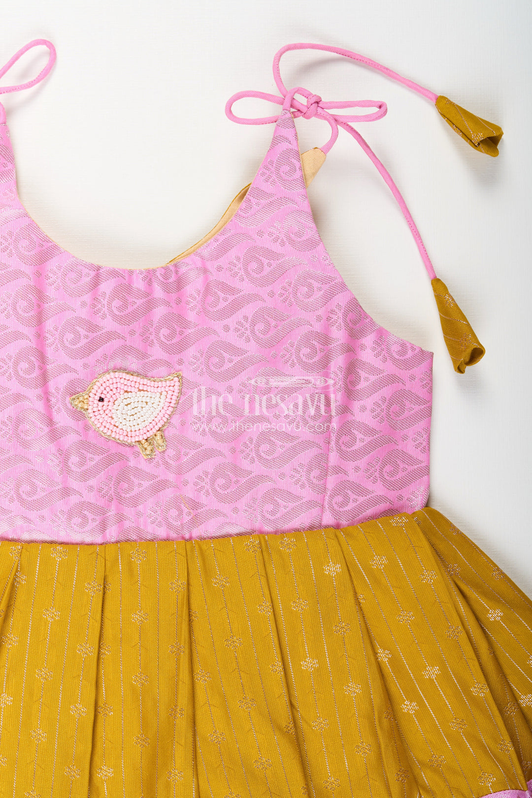 The Nesavu Tie-up Frock Pink And Mustard Frock For Baby Girls In Semi Silk Ideal For Birthdays And Traditional Gatherings Nesavu Nesavu Pink And Mustard Frock For Baby Girls Semi Silk Ethnic Dress For Birthdays And Poojas
