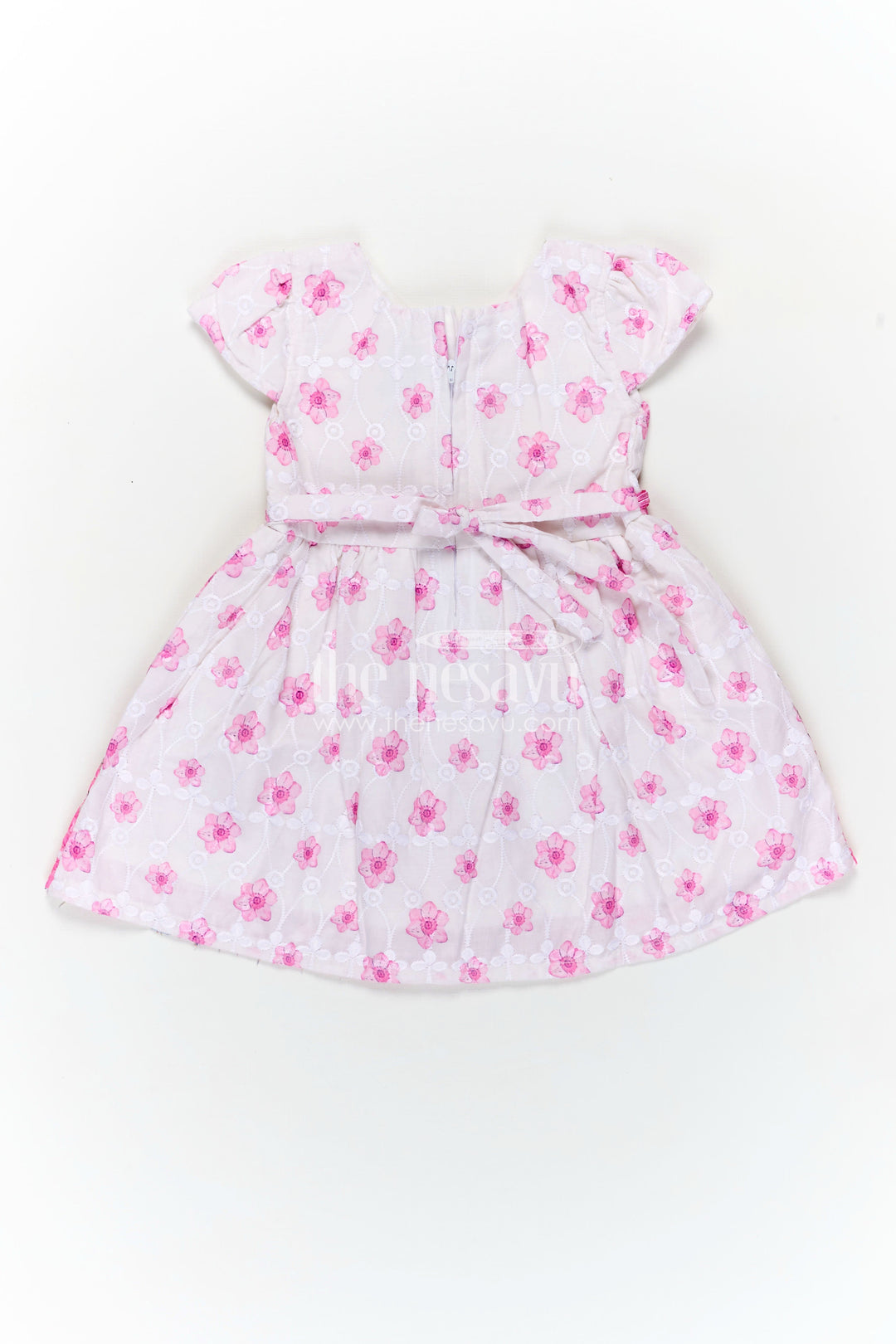 The Nesavu Baby Cotton Frocks Pink Colour Newborn Outfit in Embroidered Hakoba with Floral Motifs and Satin Waistband Nesavu Nesavu Pink Colour Newborn Cotton Outfit Floral Embroidery Satin Bow Hakoba Fabric