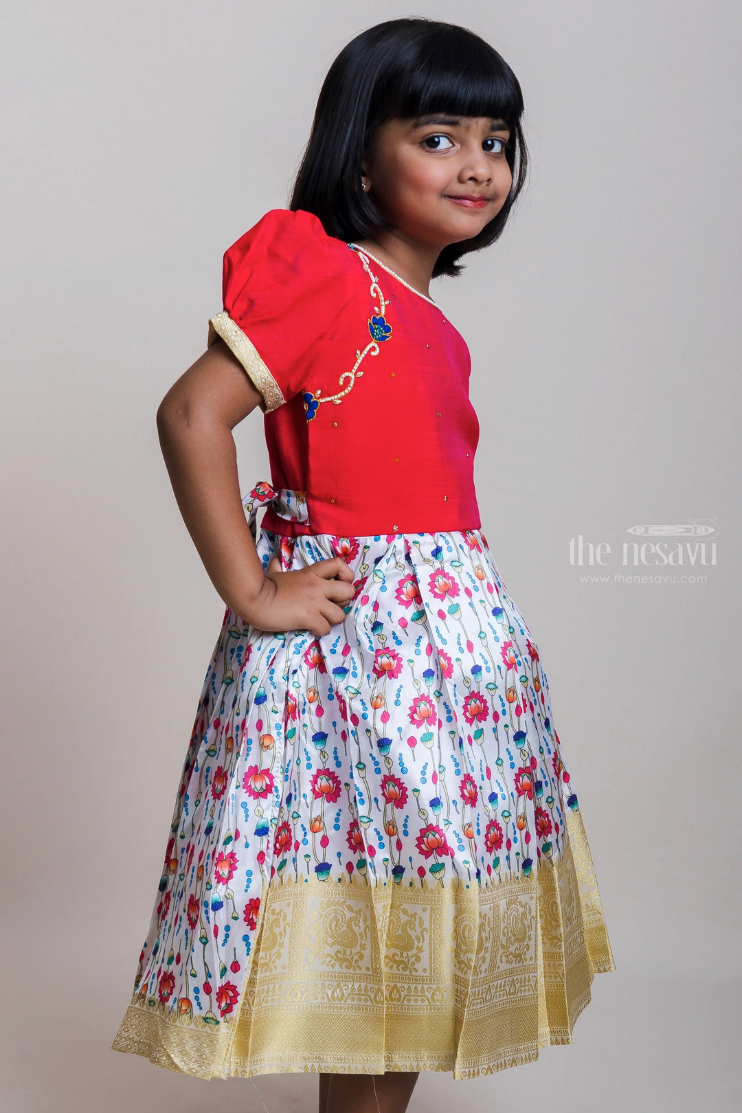 The Nesavu Silk Party Frock Pink Embroidered Yoke And Floral Printed Flare Semi-Silk Frocks For Girls Nesavu Sakranti Silk Frocks For Girls| Festive Wear Collection| The Nesavu