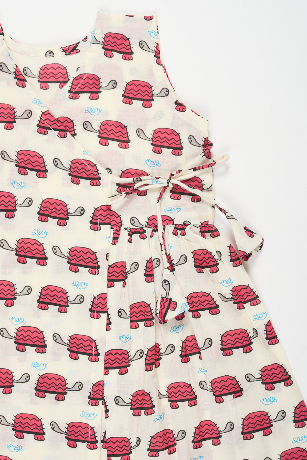 The Nesavu Baby Cotton Frocks Pink Floral Cotton Frock with Tortoise Print for Babies Comfortable and Adorable Design Nesavu Nesavu Pink Floral Cotton Baby Frock Tortoise Print Comfortable Cute Outfit