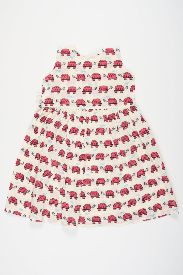 The Nesavu Baby Cotton Frocks Pink Floral Cotton Frock with Tortoise Print for Babies Comfortable and Adorable Design Nesavu Nesavu Pink Floral Cotton Baby Frock Tortoise Print Comfortable Cute Outfit