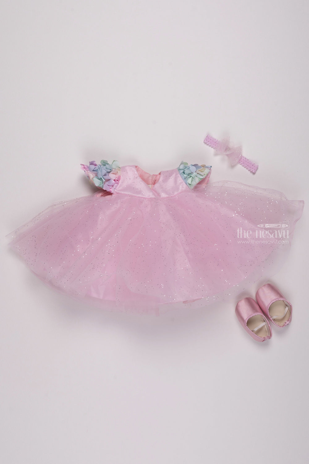The Nesavu Girls Tutu Frock Pink Perfection: Glittering Net Frock with Delicate Floral Highlights for Girls Nesavu Chic & Trendy: Discover our Baby Girl Party Wear Frocks Collection | The Nesavu
