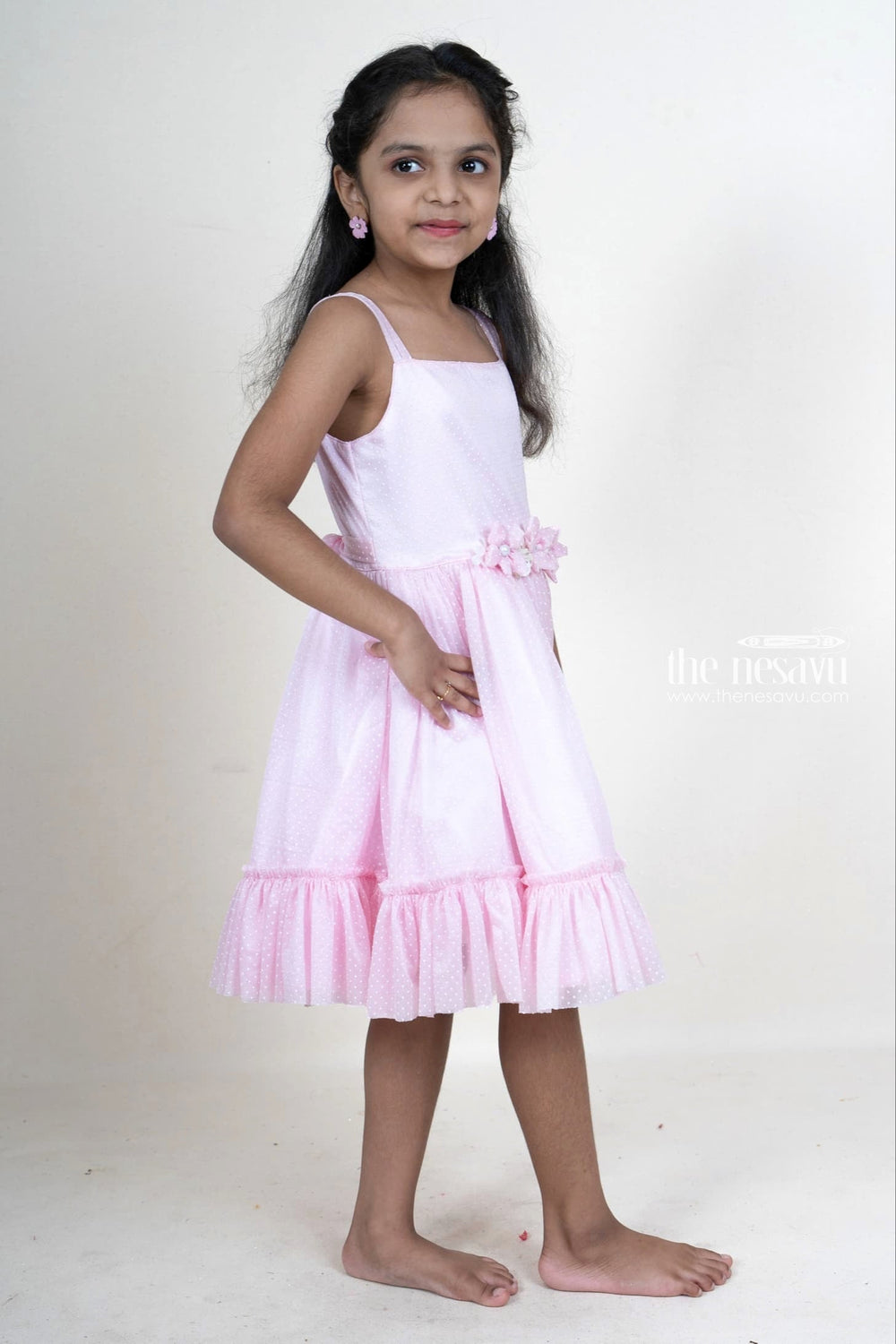 The Nesavu Girls Fancy Party Frock pink self patterned sleeveless party gown with floral embellishments for girls Nesavu