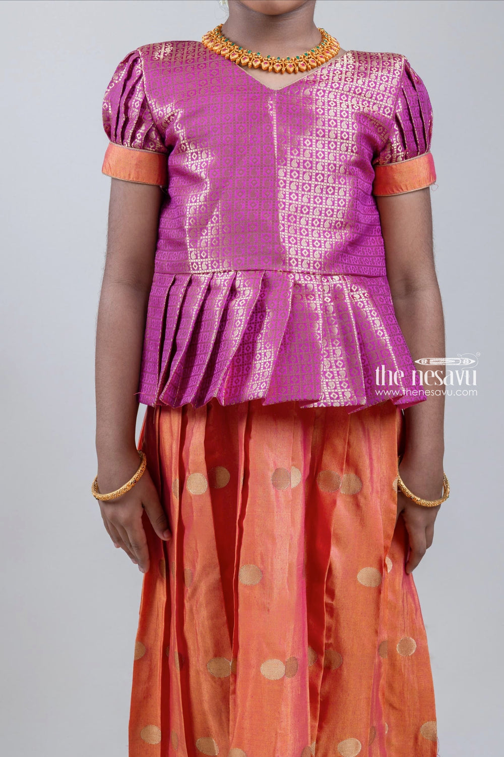 The Nesavu Pattu Pavadai Premium Zari Paisley Designer Pink Silk Peplum Blouse with Knife Pleated yellow Silk Skirt for Girls Nesavu Zari Paisley Designer Pink Silk Peplum Blouse with Knife Pleated Yellow Silk Skirt for Girls | Shop at The Nesavu