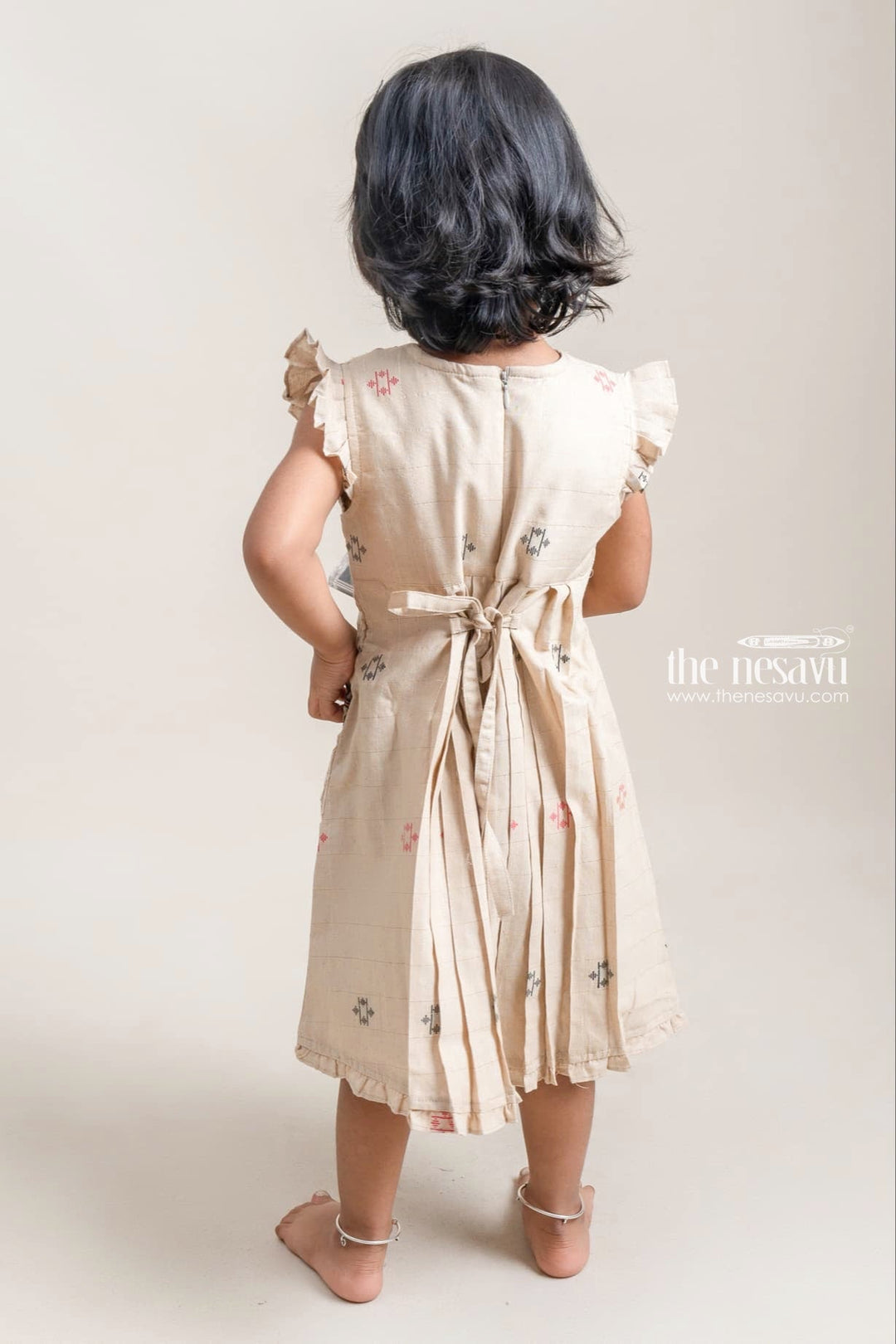 The Nesavu Girls Cotton Frock Pretty Beige Butta Printed Sleeveless Pleated Cotton Frock For Girls Nesavu Stylish Cotton Frock For Girls | New Arrivals For Girls | The Nesavu