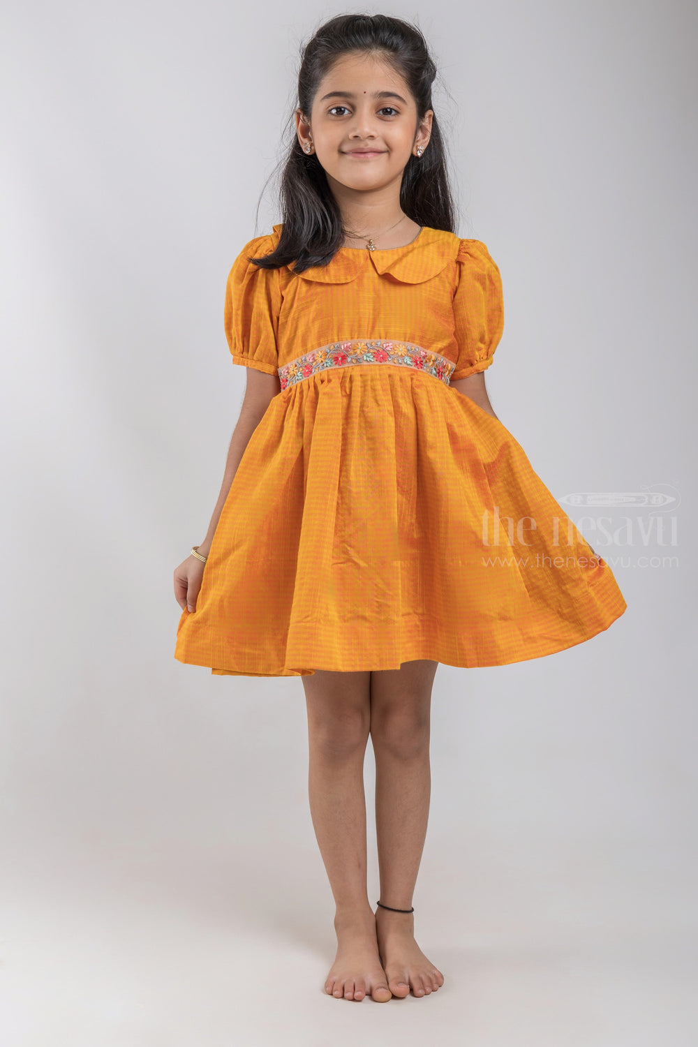 The Nesavu Silk Embroidered Frock Pretty Yellow Modal Silk Frock With Embroidered Waist and Puffed Sleeves For Girls psr silks Nesavu