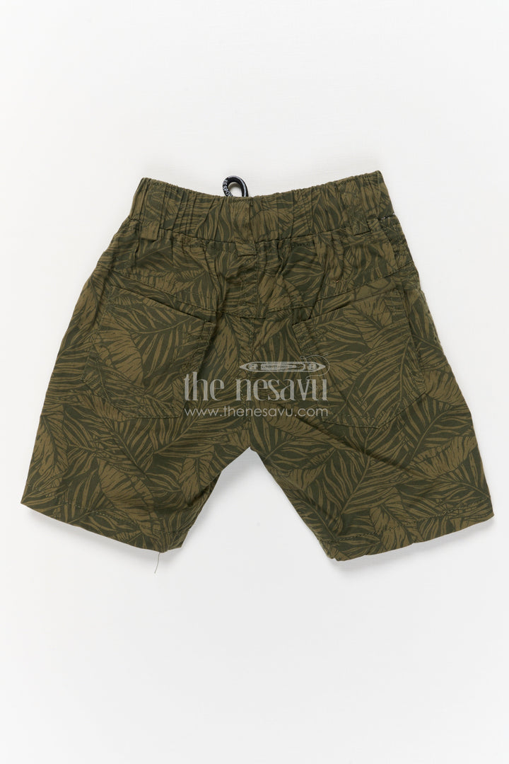 The Nesavu Boys Shorts Printed Boys Cotton Shorts with Drawstring and Leaf Pattern Nesavu Boys cotton printed shorts with tropical leaf pattern and elastic waistband