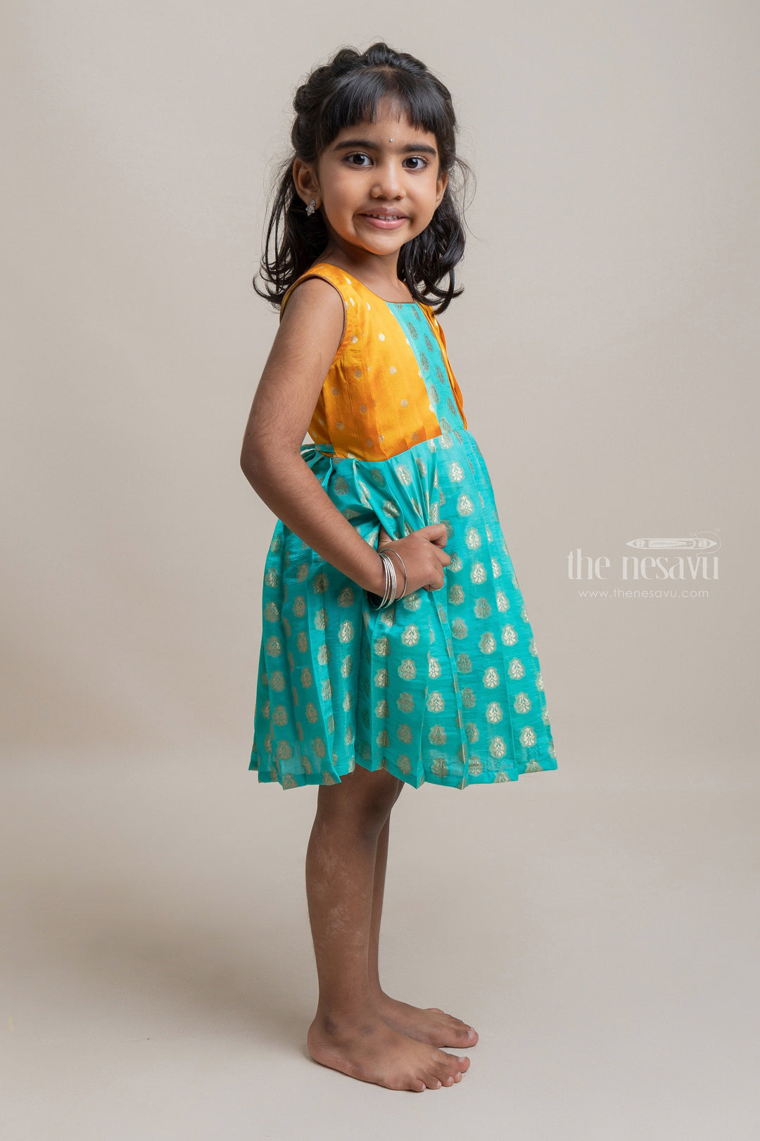The Nesavu Silk Frock Radiant Green Pleated Semi-Silk with Designer Yoke Frock For Girls Nesavu Shop the Best Selection of Silk Frocks at The Nesavu | Nesavu New Collection | Silk Frock