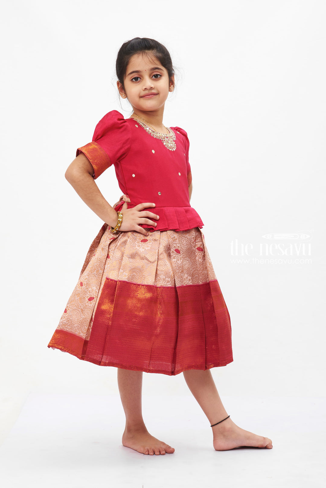 The Nesavu Silk Party Frock Regal Ruby Silk Frock with Embellished Golden Border for Girls Nesavu Ruby Red Silk Frock for Girls with Golden Embroidery | Luxurious Festive Wear | The Nesavu