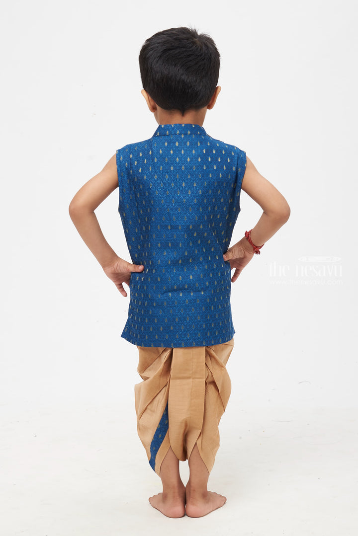 The Nesavu Boys Dothi Set Royal Blue Radiance: Boys' Paisley Brocade Waistcoat with Contrast Taupe Trousers Nesavu Boys Royal Blue Kurta with Golden Panchagajam | Timeless Look for Traditional Events | The Nesavu