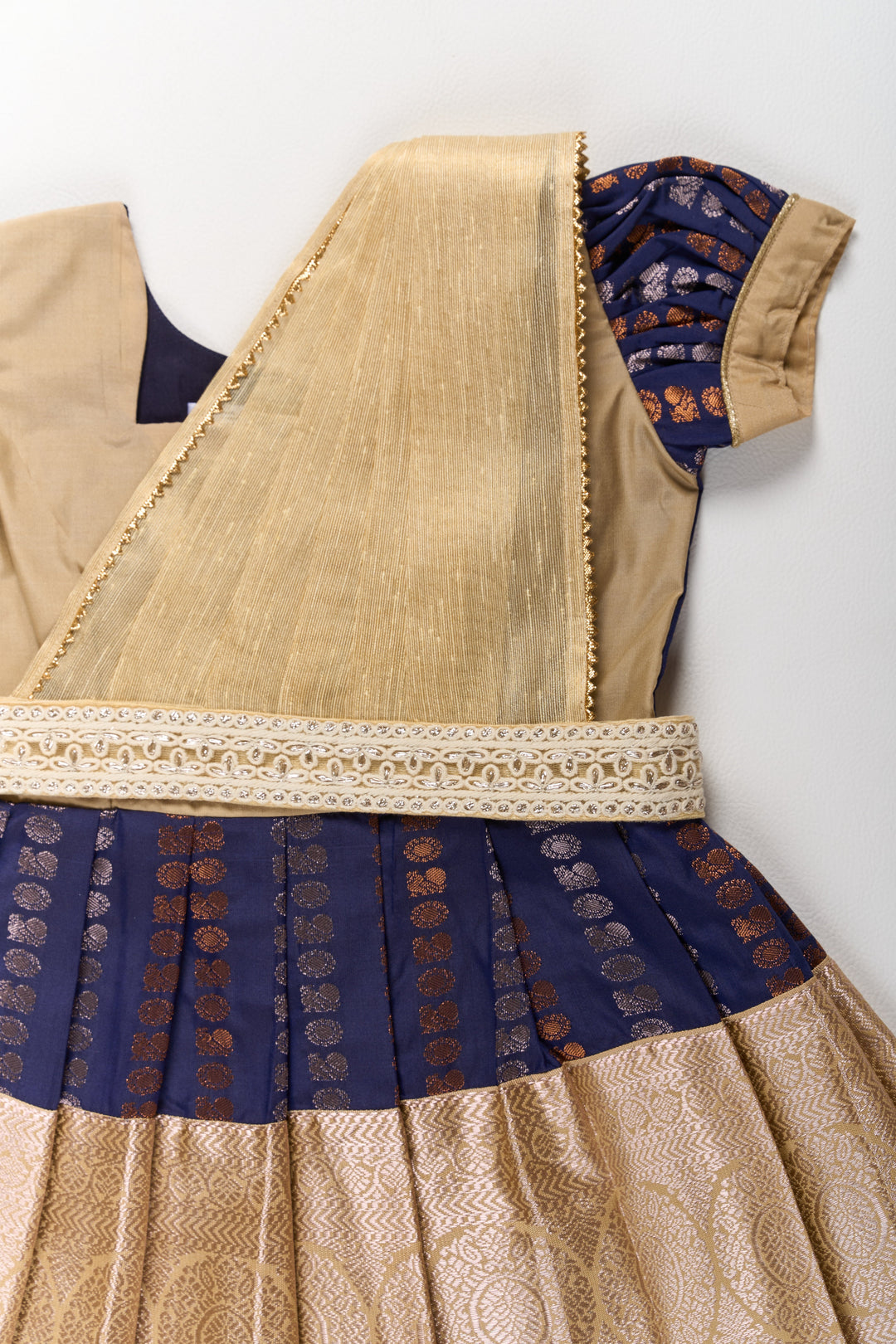 The Nesavu Girls Kanchi Silk Frock Royal Purple and Gold Pattu Pavadai Sattai for Girls with Zari Embellishments Nesavu Nesavu Royal Purple Gold Pattu Pavadai Sattai Girls Zari Embellishments