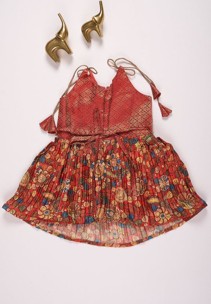 The Nesavu Tie-up Frock Rust Orange and Multicolor Ethnic Dress for Girls Nesavu Orange and Maroon Pleated Chinon Designer Baby Frock with Tie-Up Straps - Stylish & Luxurious