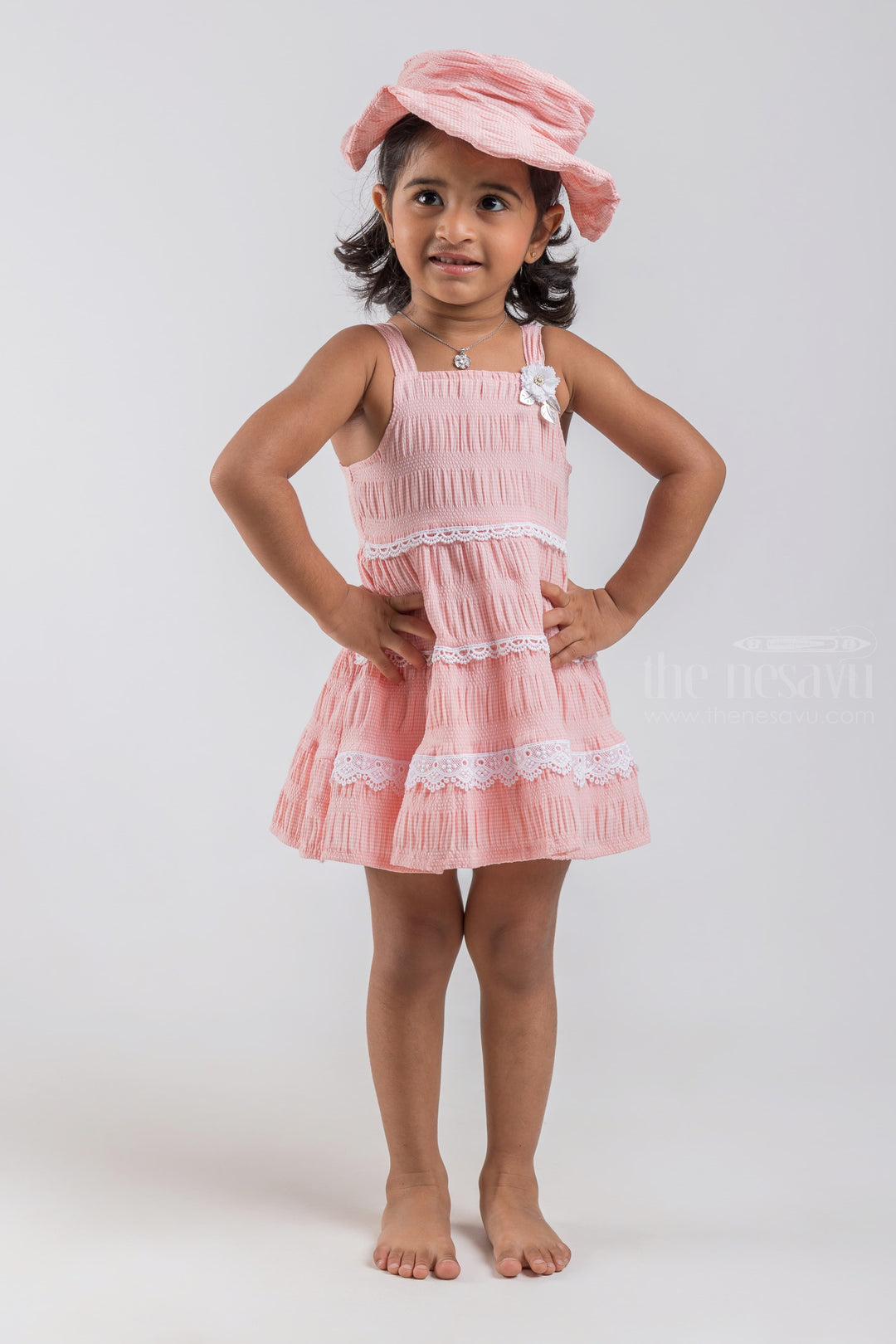The Nesavu Baby Cotton Frocks Salmon Pink Sleeveless Layered Cotton Frock with Embellished Lace and Flower Applique for Baby Girls and Cap psr silks Nesavu 14 (6M) / Salmon / Cotton BFJ404A