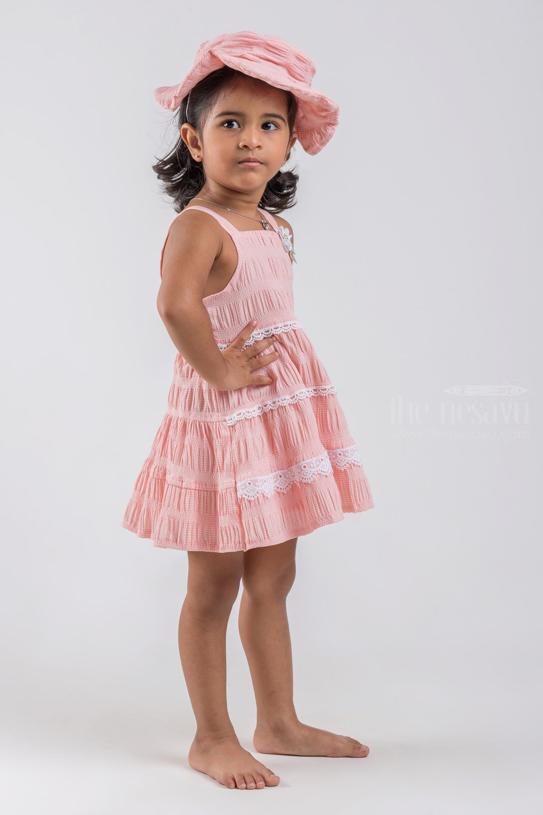 The Nesavu Baby Cotton Frocks Salmon Pink Sleeveless Layered Cotton Frock with Embellished Lace and Flower Applique for Baby Girls and Cap psr silks Nesavu