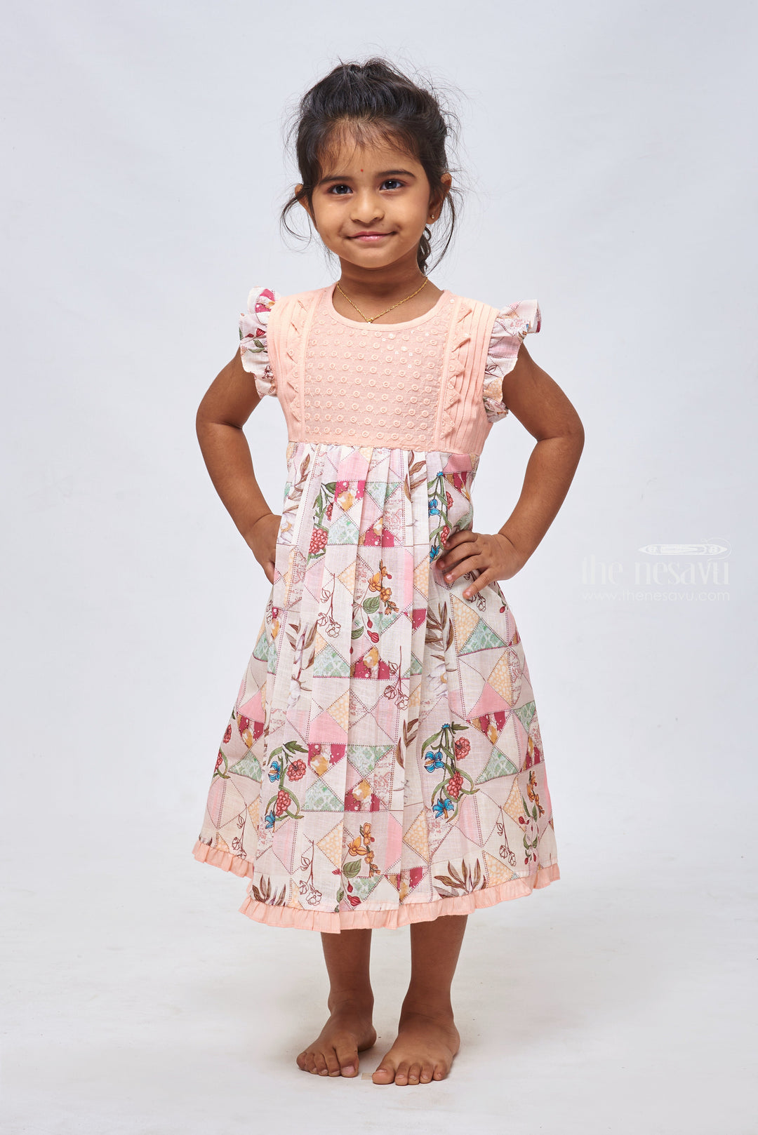 The Nesavu Girls Cotton Frock Salmon Sunset: Knief Pleated Salmon Cotton Frock with Geometric Print Nesavu 22 (4Y) / Salmon / Cotton GFC1146B-22 Designer Baby Frocks: Elegant Cotton & Crochet Dresses for Girls | The Nesavu