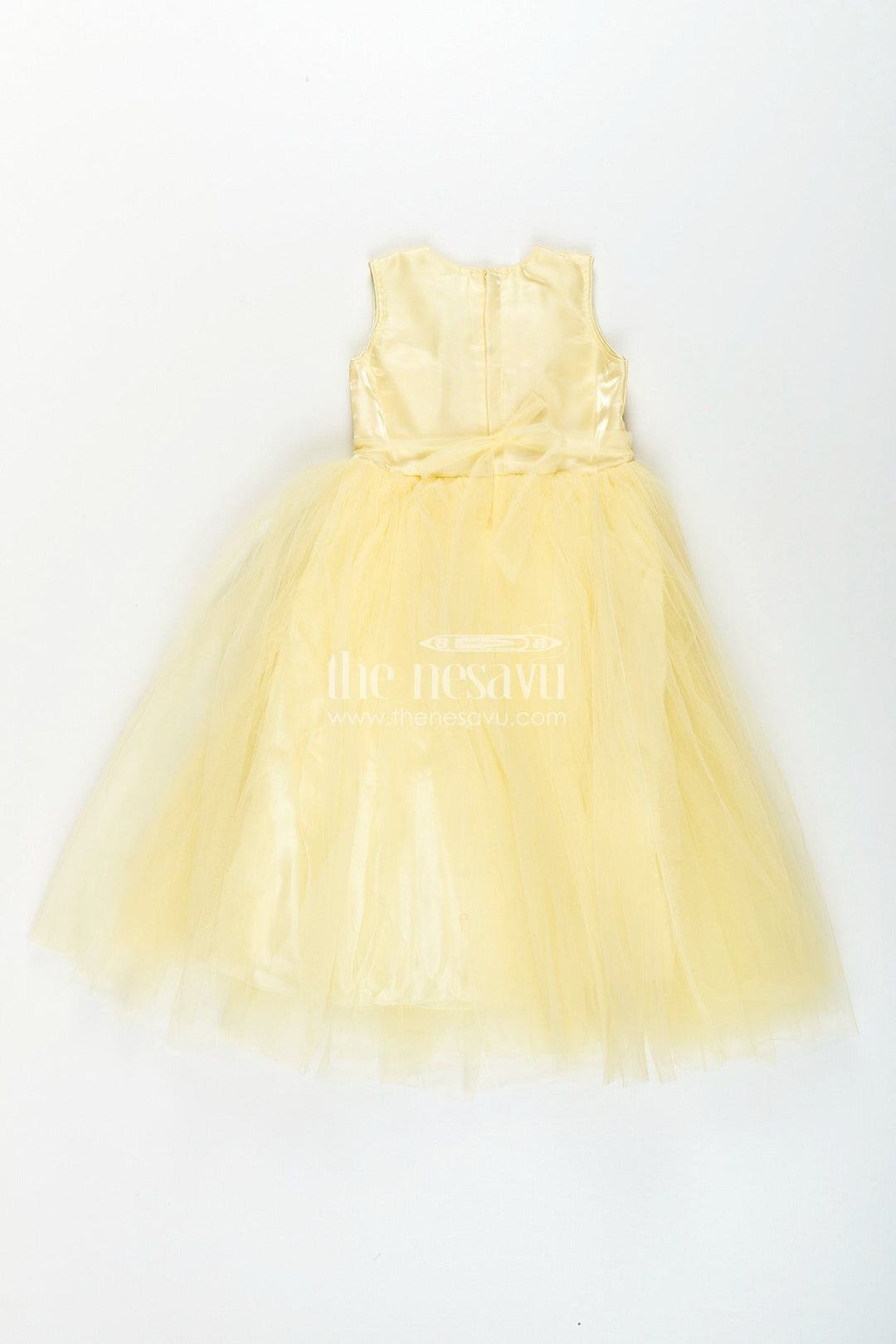 The Nesavu Girls Party Gown Satin and net party gown for girls with bead embroidery Nesavu Nesavu girls yellow party gown with satin bodice and embroidered net flare