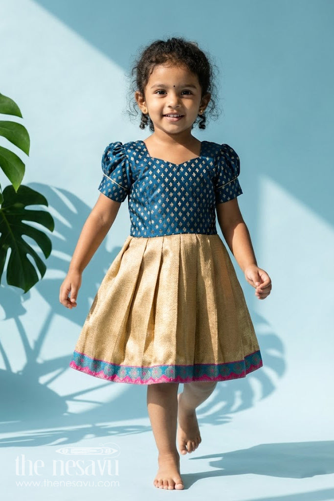 The Nesavu Silk Frock Silk Puff Dress for Girls with Navy Yoke and Gold Pleated Skirt Finished with Pink and Green Zari Border Nesavu 16 (1Y) / Blue SF1028B-16 Nesavu Silk Puff Dress Girls Butta Yoke Gold Pleated Skirt Zari Border