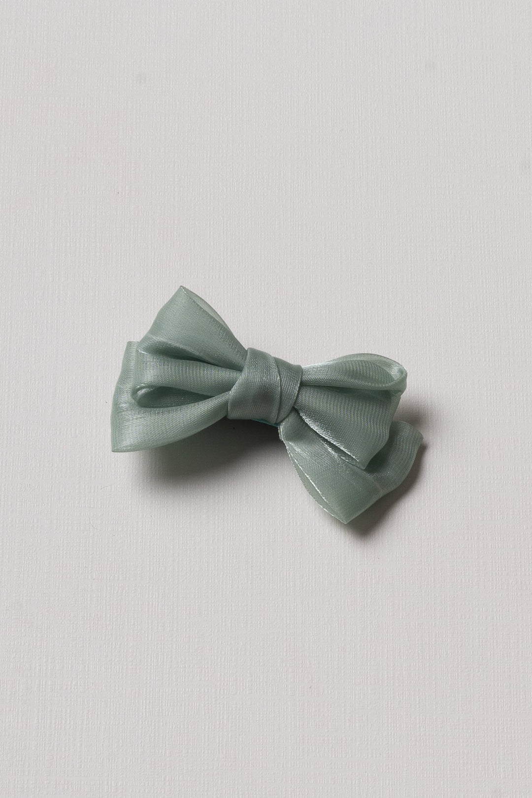 The Nesavu Hair Clip Sleek Sage Bow: The Perfect Touch of Grace for Her Hair Nesavu Green JHCL77B Elegant Sage Green Satin Bow Clip | Chic Hair Accessory for Graceful Styles | The Nesavu