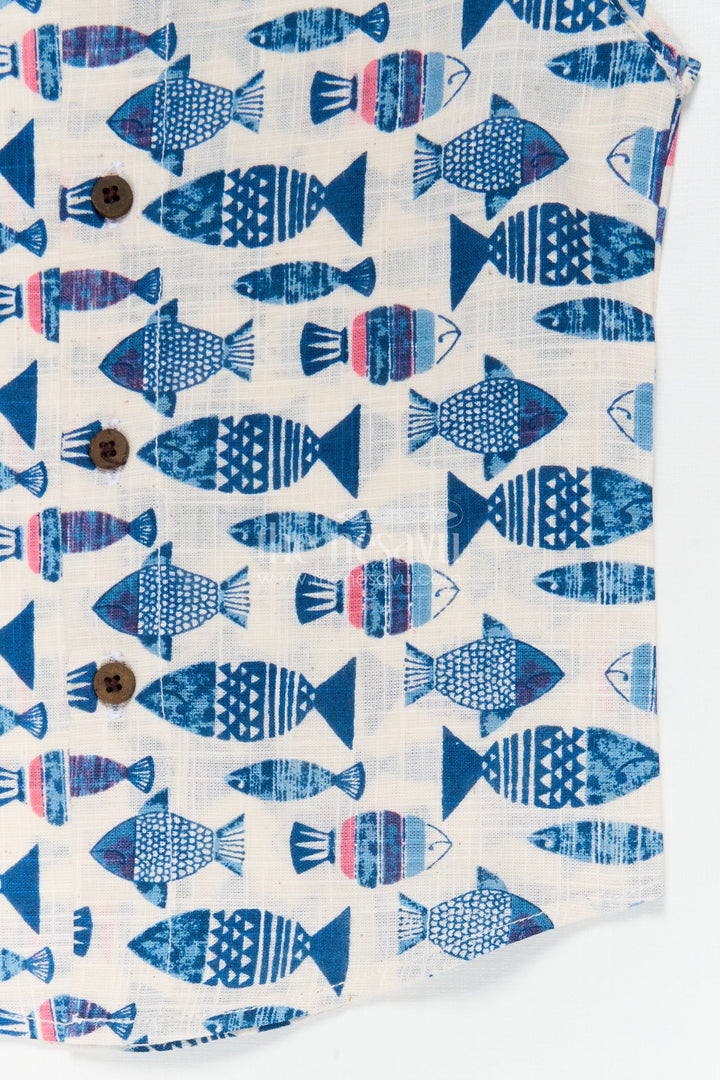 The Nesavu Baby Jablas Sleeveless Baby Jabla with Fish Print for Summer Comfort Nesavu 10 (NB) / Blue / Cotton IF049D-10 Nesavu sleeveless cotton jabla for babies with fun fish print and wooden button closure