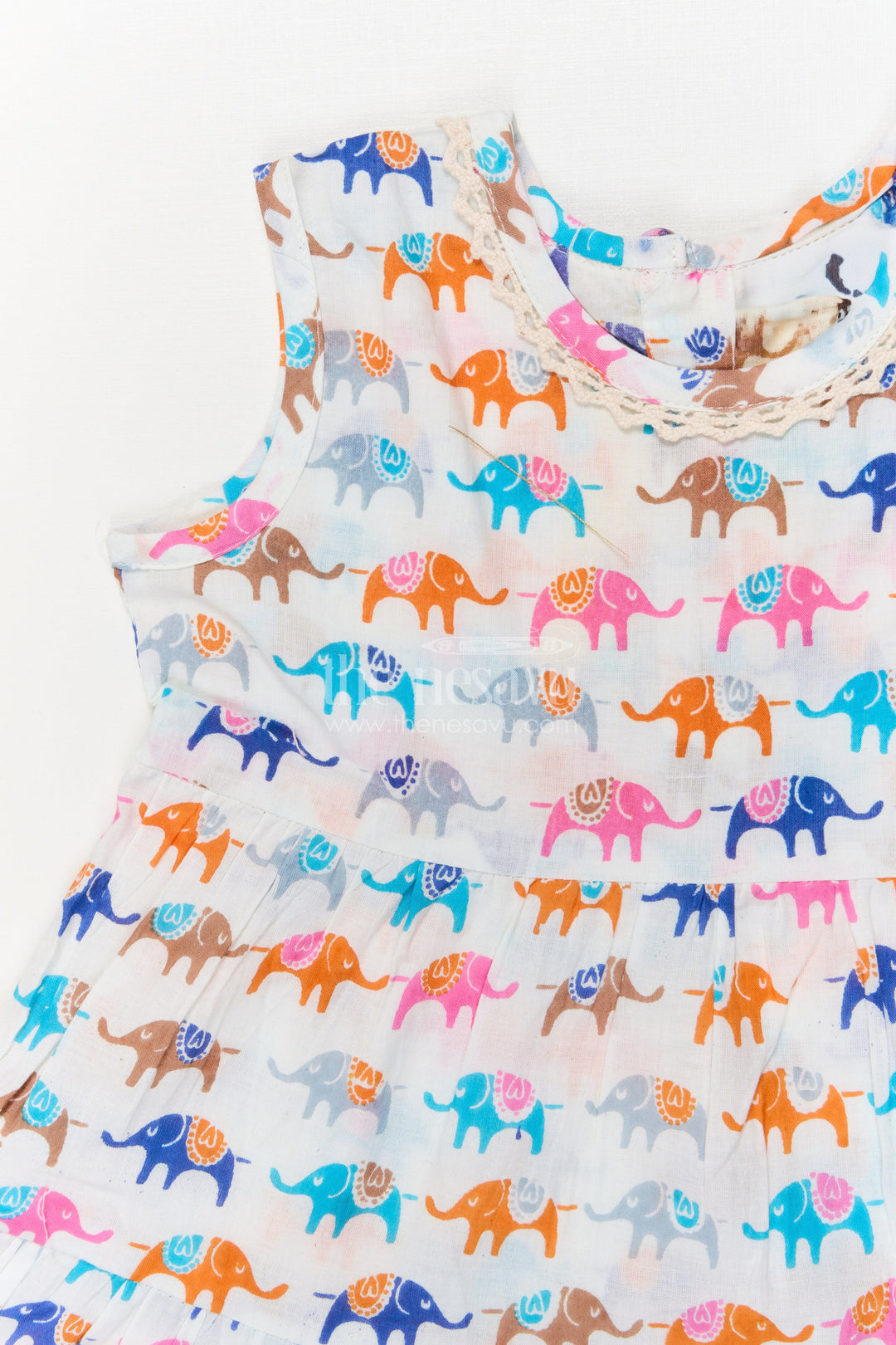The Nesavu Girls Cotton Frock Sleeveless Cotton Frock for Girls with Multicolor Elephant Print Nesavu Nesavu girls sleeveless cotton frock with multicolor elephant print – perfect for zoo trips and play