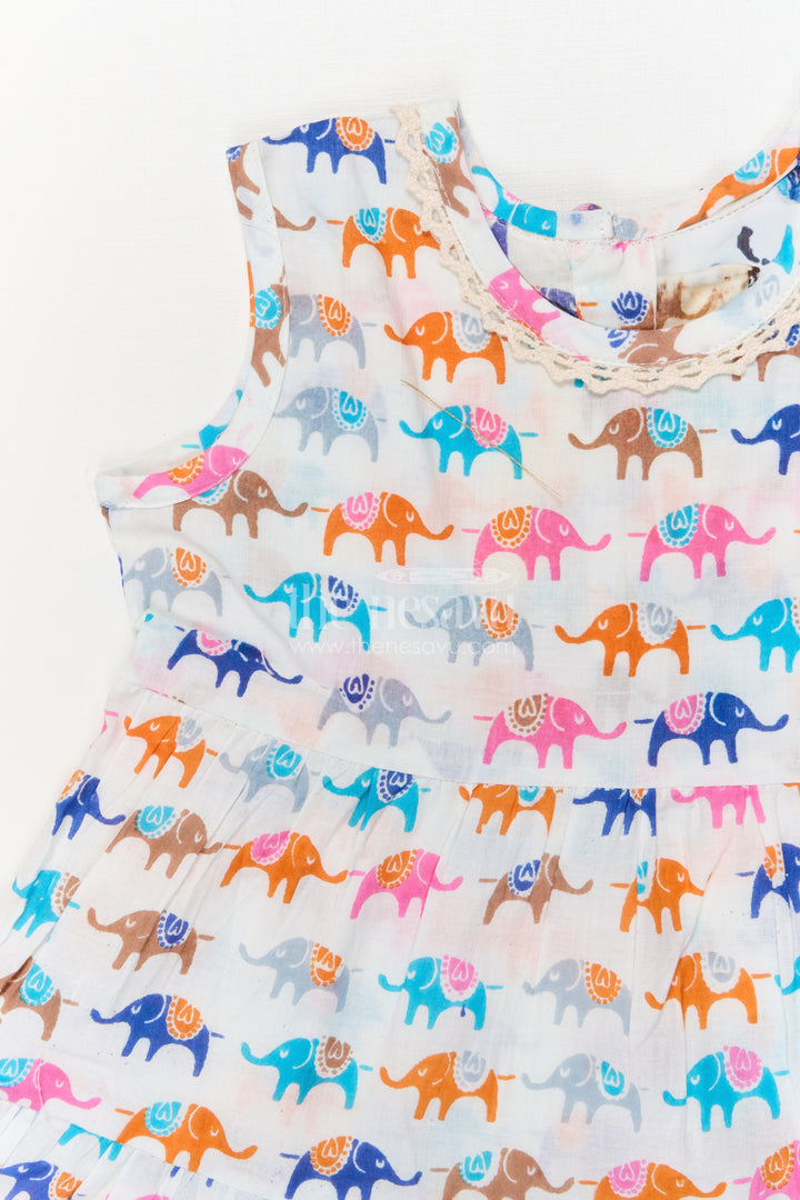 The Nesavu Girls Cotton Frock Sleeveless Cotton Frock for Girls with Multicolor Elephant Print Nesavu Nesavu girls sleeveless cotton frock with multicolor elephant print – perfect for zoo trips and play