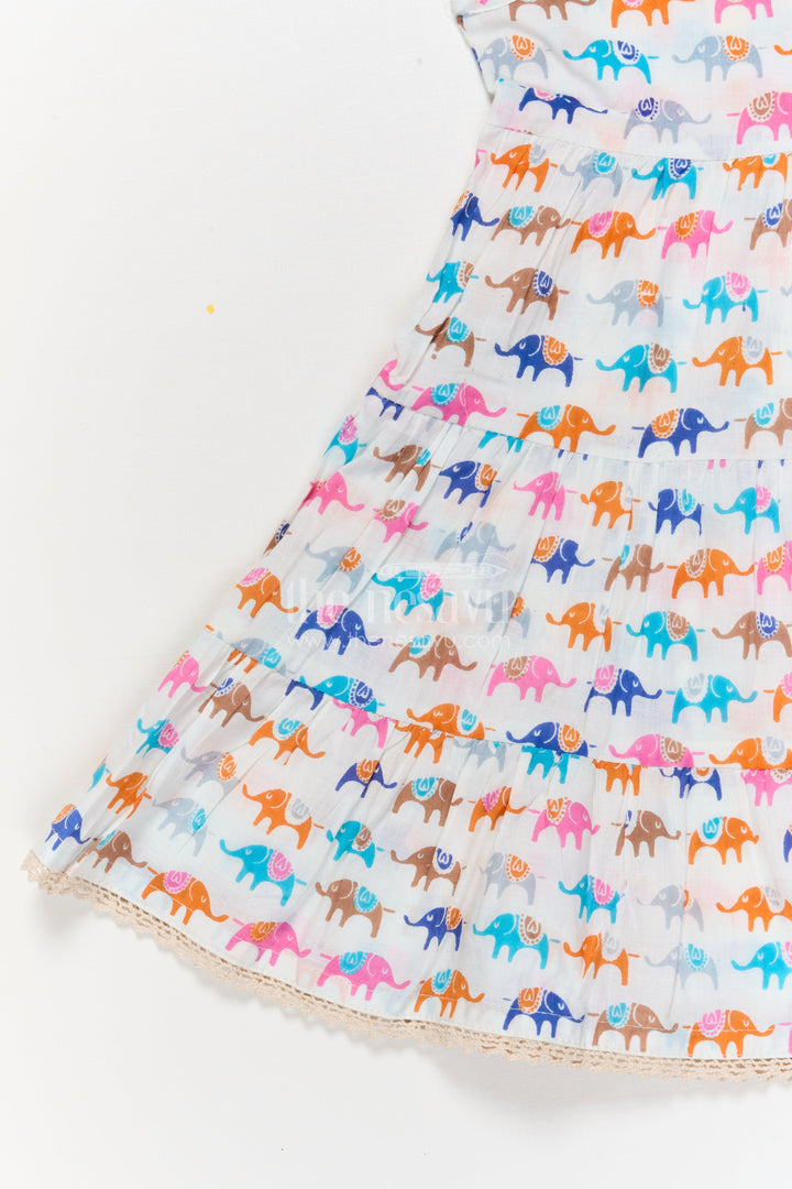 The Nesavu Girls Cotton Frock Sleeveless Cotton Frock for Girls with Multicolor Elephant Print Nesavu Nesavu girls sleeveless cotton frock with multicolor elephant print – perfect for zoo trips and play