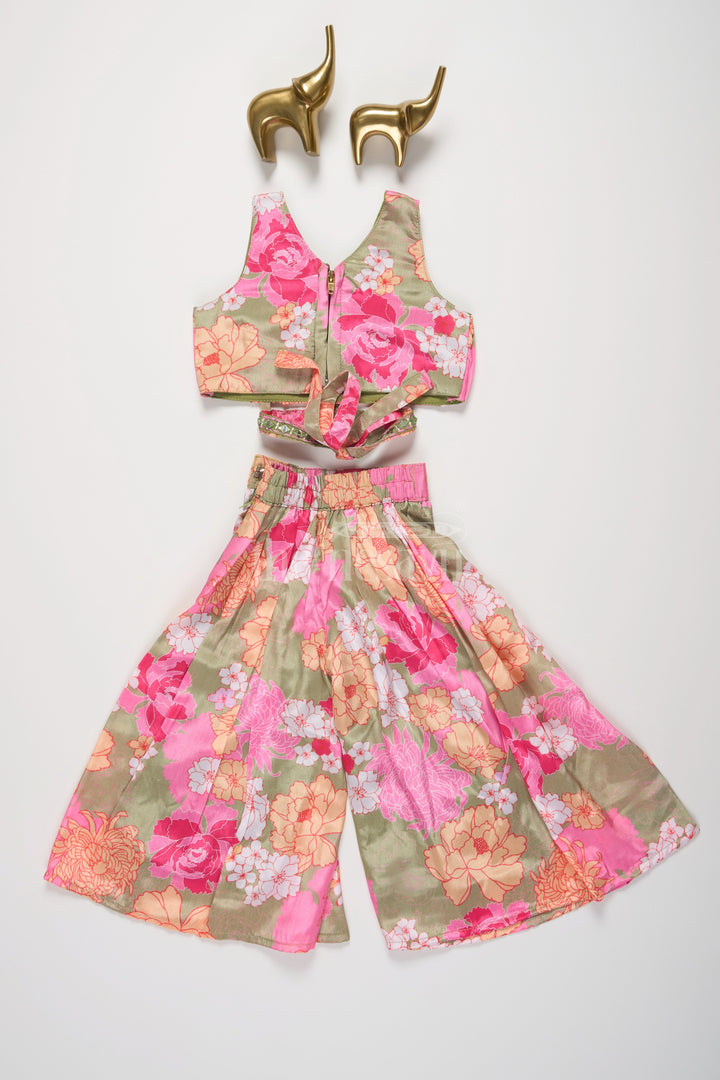 The Nesavu Girls Sharara / Plazo Set Sleeveless Pink Floral Girls Sharara Set with Beaded Detailing and Wide-Legged Palazzo Pants Nesavu Nesavu Pink Floral Girls Sharara Set Beaded V-Neck Top Wide-Leg Palazzo Pants
