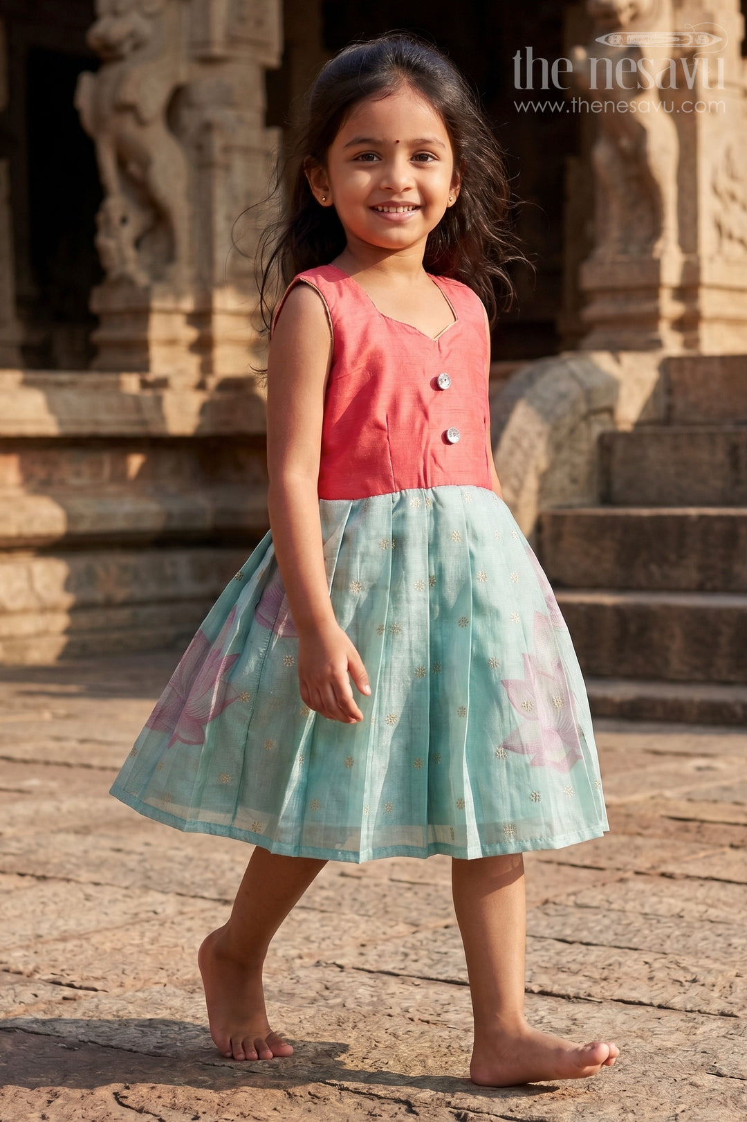 The Nesavu Silk Frock Sleeveless Silk Frock for Baby Girls with Lotus Print for Festive Wear Nesavu 18 (2Y) / Pink / Silk Blend SF1113A-18 Nesavu sleeveless silk frock for baby girls with lotus motif and pleated skirt – perfect for ethnic occasions