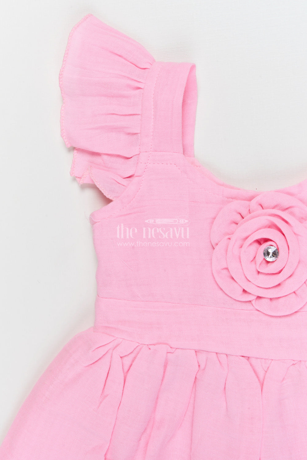 The Nesavu Girls Cotton Frock Soft Cotton Frock for Baby Girls’ Playful Outings Nesavu Nesavu baby girl cotton frock with rosette detail and flutter sleeves for casual wear