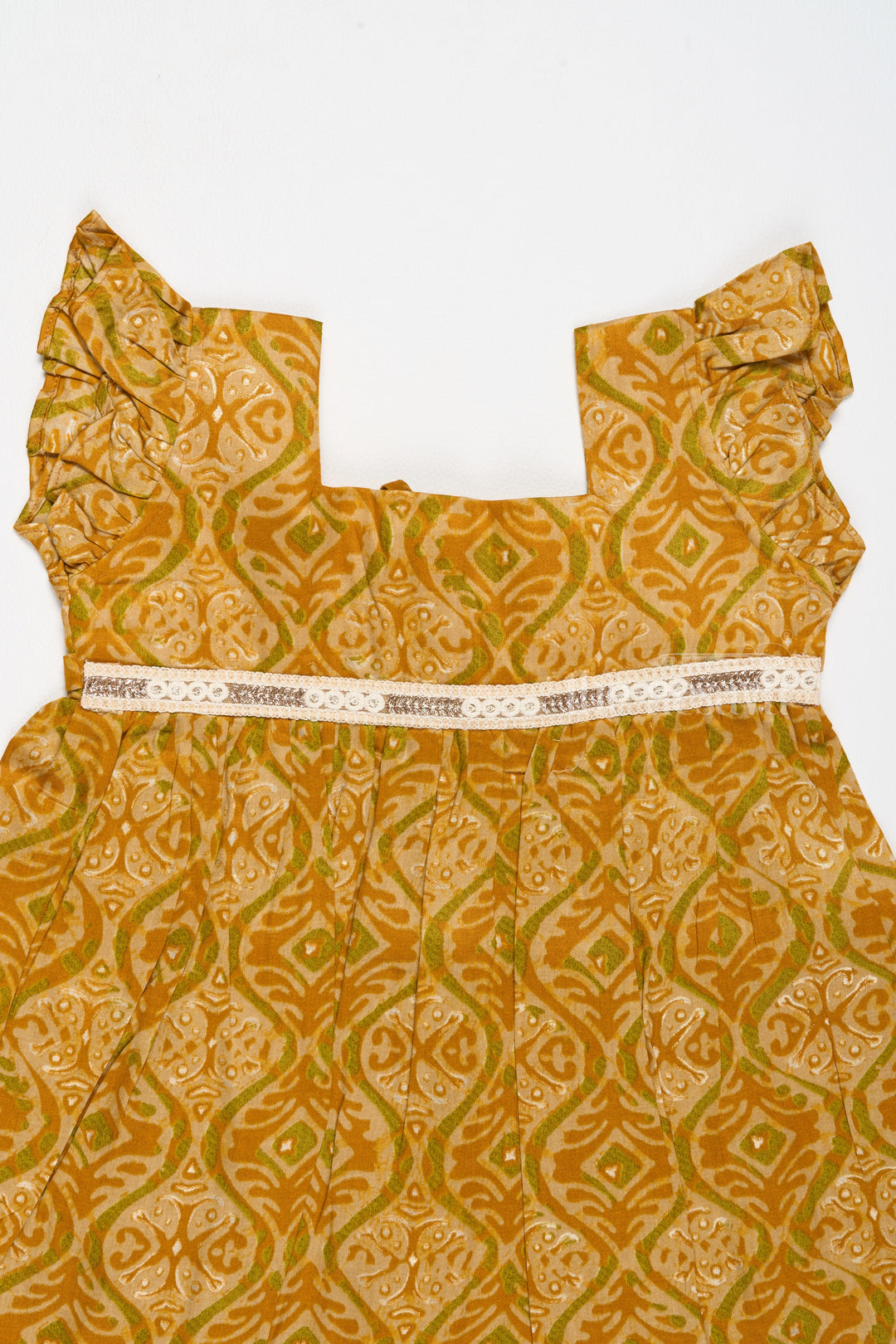 The Nesavu Girls Cotton Frock Solid Cotton Dress for Girls in Mustard with Ruffle and Lace Details Nesavu Nesavu Solid Cotton Dress Girls Lace Waistband Ruffle Hem Mustard