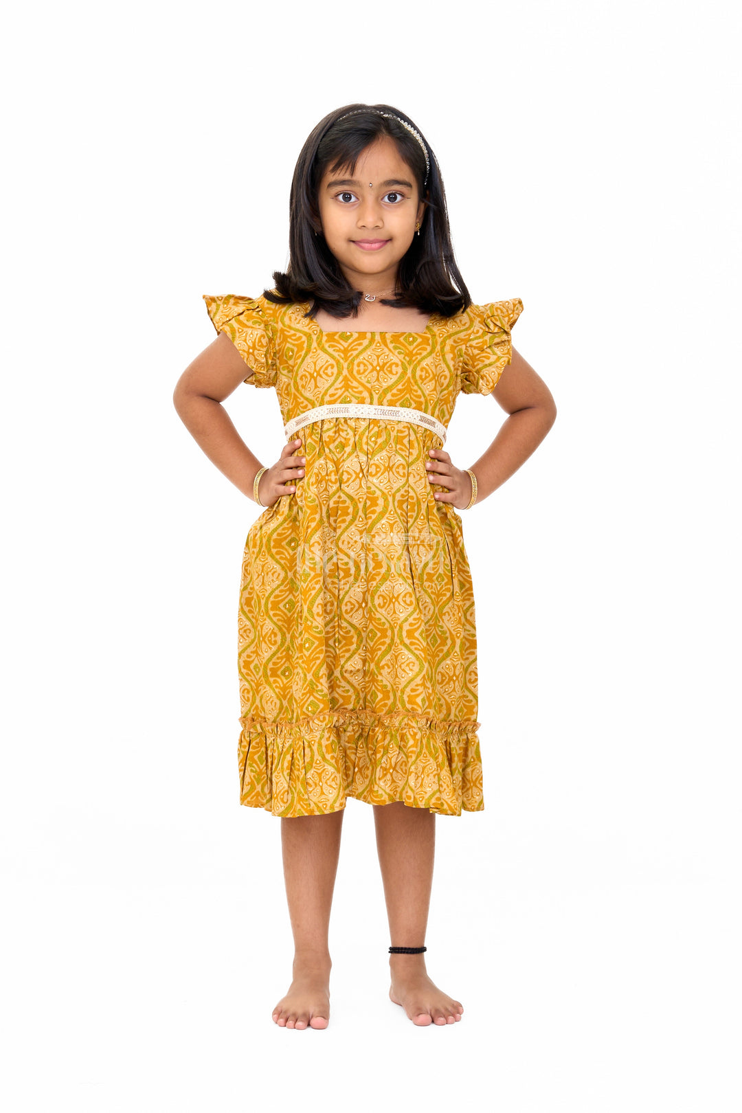 The Nesavu Girls Cotton Frock Solid Cotton Dress for Girls in Mustard with Ruffle and Lace Details Nesavu Nesavu Solid Cotton Dress Girls Lace Waistband Ruffle Hem Mustard