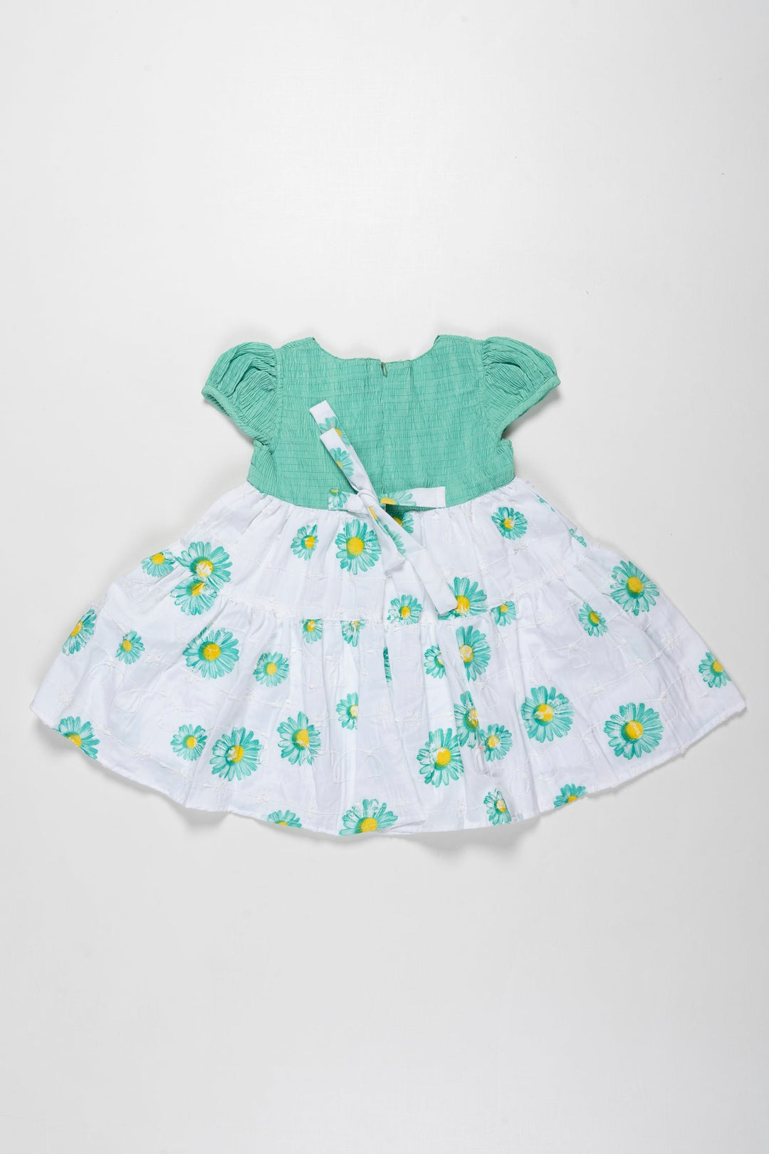 The Nesavu Girls Cotton Frock Springtime Blossom Girls Green Cotton Frock with Floral Accents Nesavu Girls Green Floral Print Cotton Frock | Perfect for Spring/Summer | The Nesavu