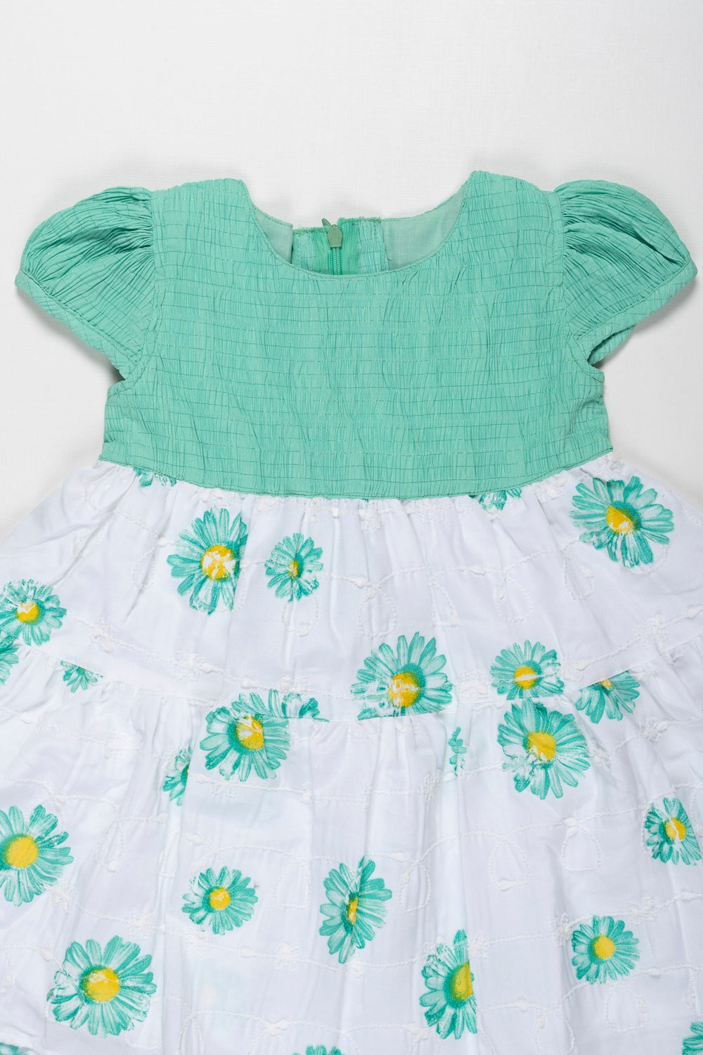 The Nesavu Girls Cotton Frock Springtime Blossom Girls Green Cotton Frock with Floral Accents Nesavu Girls Green Floral Print Cotton Frock | Perfect for Spring/Summer | The Nesavu
