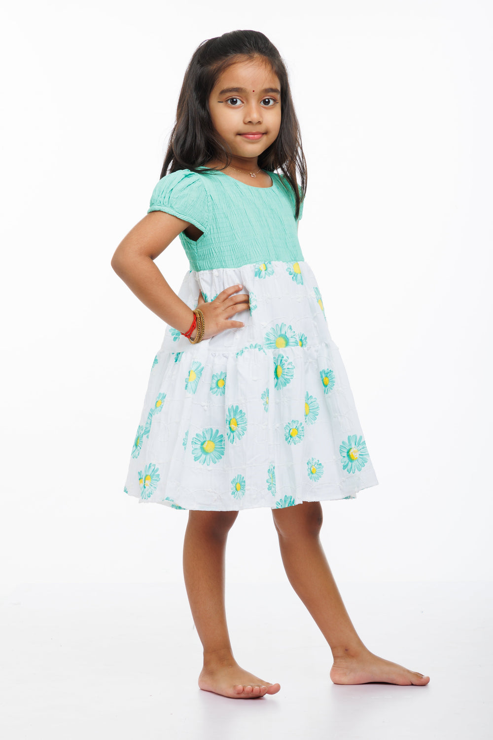 The Nesavu Girls Cotton Frock Springtime Blossom Girls Green Cotton Frock with Floral Accents Nesavu Girls Green Floral Print Cotton Frock | Perfect for Spring/Summer | The Nesavu