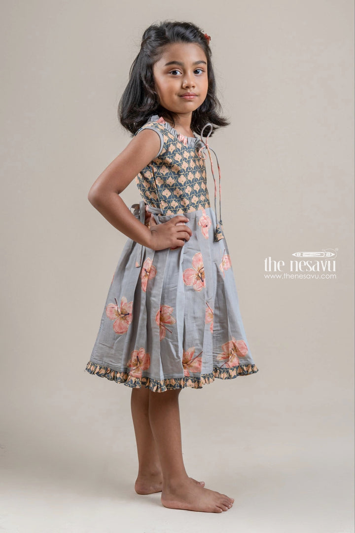 The Nesavu Girls Fancy Frock Stunning Gray Chanderi Floral Printed Cotton Frock with Tiny Ruffle Hem Nesavu Adorable Cotton Frocks for Girls | Cotton Frocks | The Nesavu