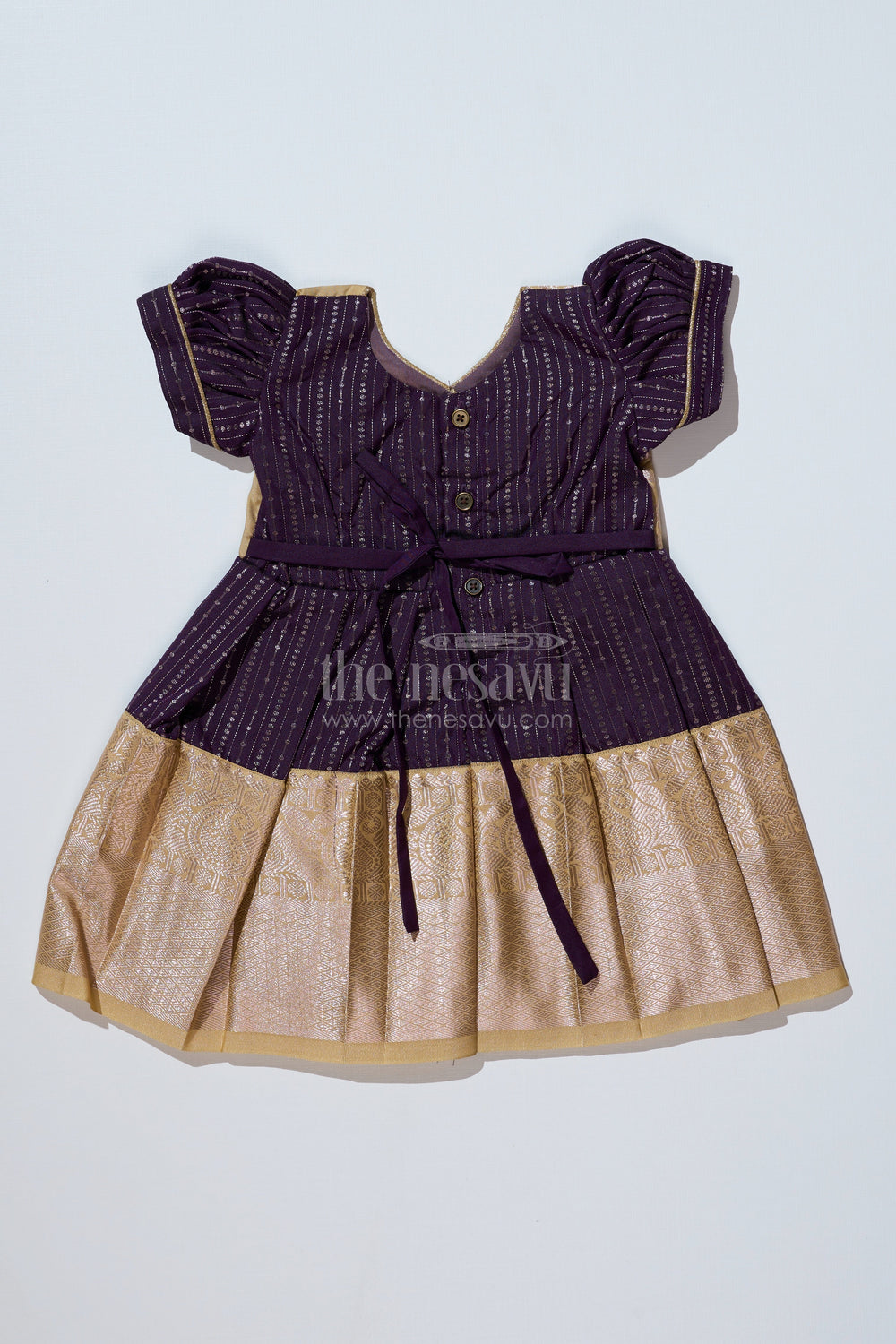 The Nesavu Girls Kanchi Silk Frock Stunning Magenta Silk Dress for Girls with Kanchipuram Inspired Fabric and Gold Zari Pleated Border Nesavu Nesavu Magenta Silk Dress Girls Kanchipuram Inspired Fabric Gold Zari Pleated Border