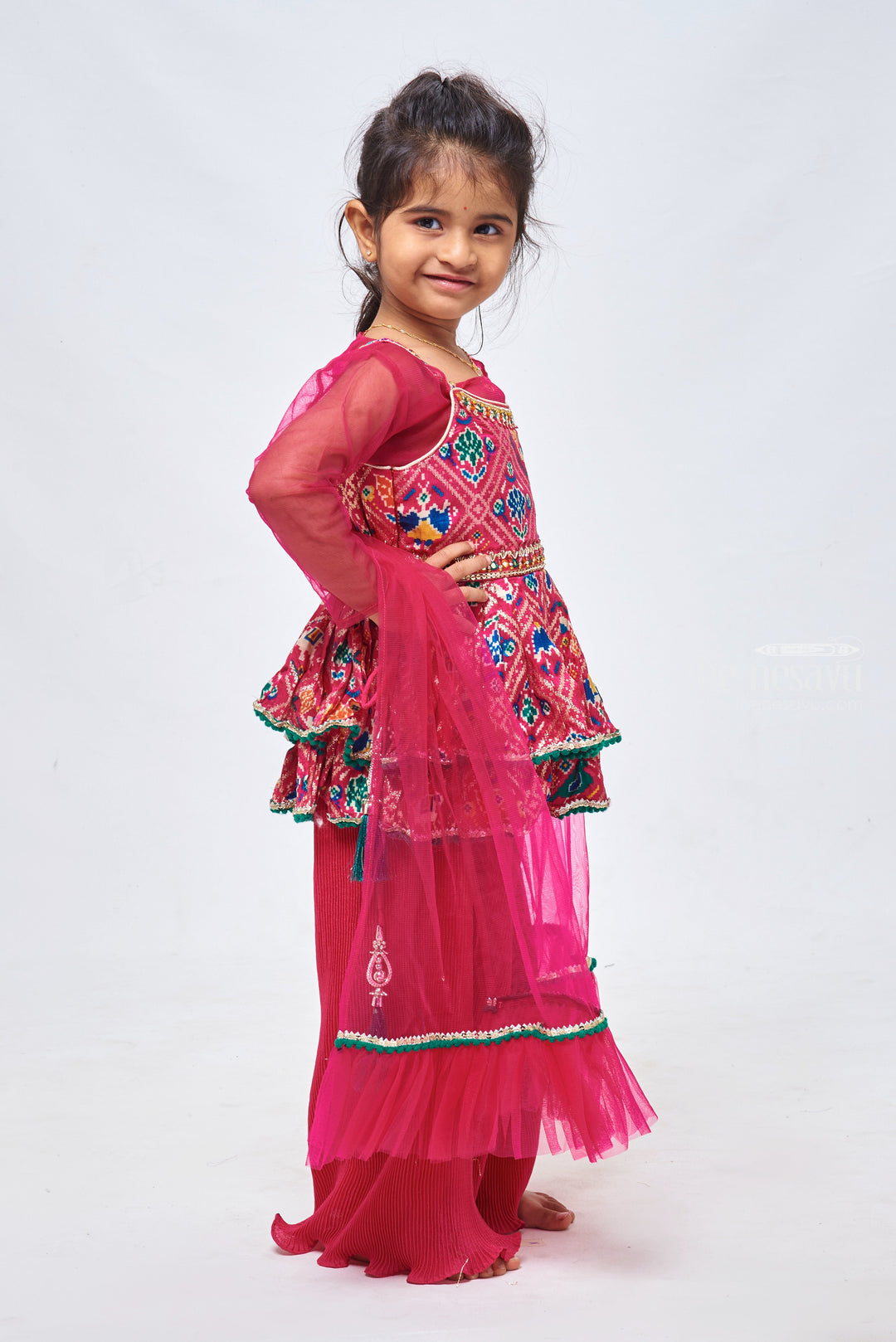 The Nesavu Girls Sharara / Plazo Set Stunning Sequins Embroidered Patola Designer Pink Peplum Kurti with Palazzo: Traditional Grace for Girls. Nesavu Patola Designer Pink Kurti with Palazzo set | Girls Festive Collecetions | The Nesavu